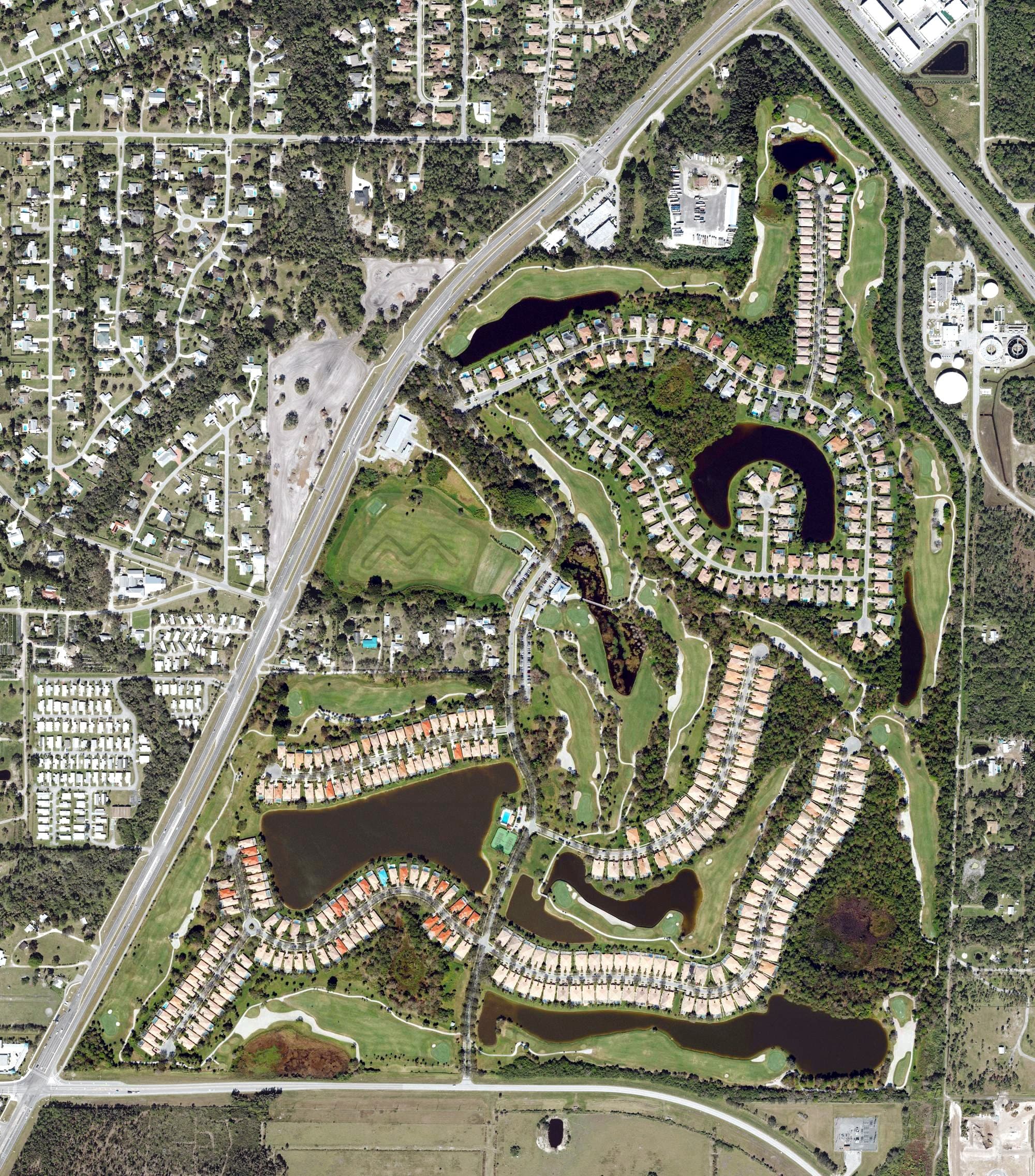 Aerial view of The Florida Club, FL, with its hole routing marked