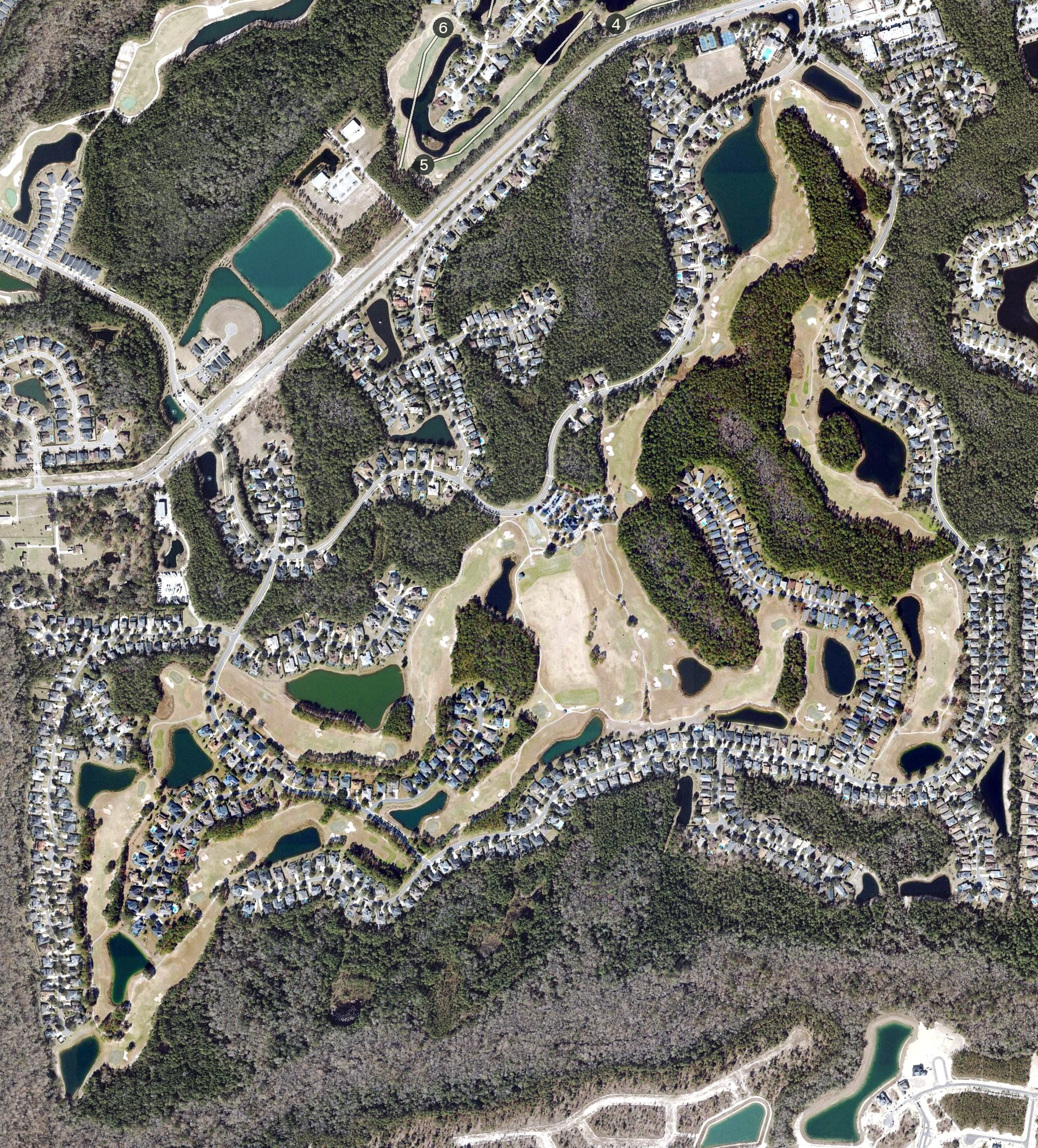Aerial view of The Golf Club at South Hampton, FL, with its hole routing marked