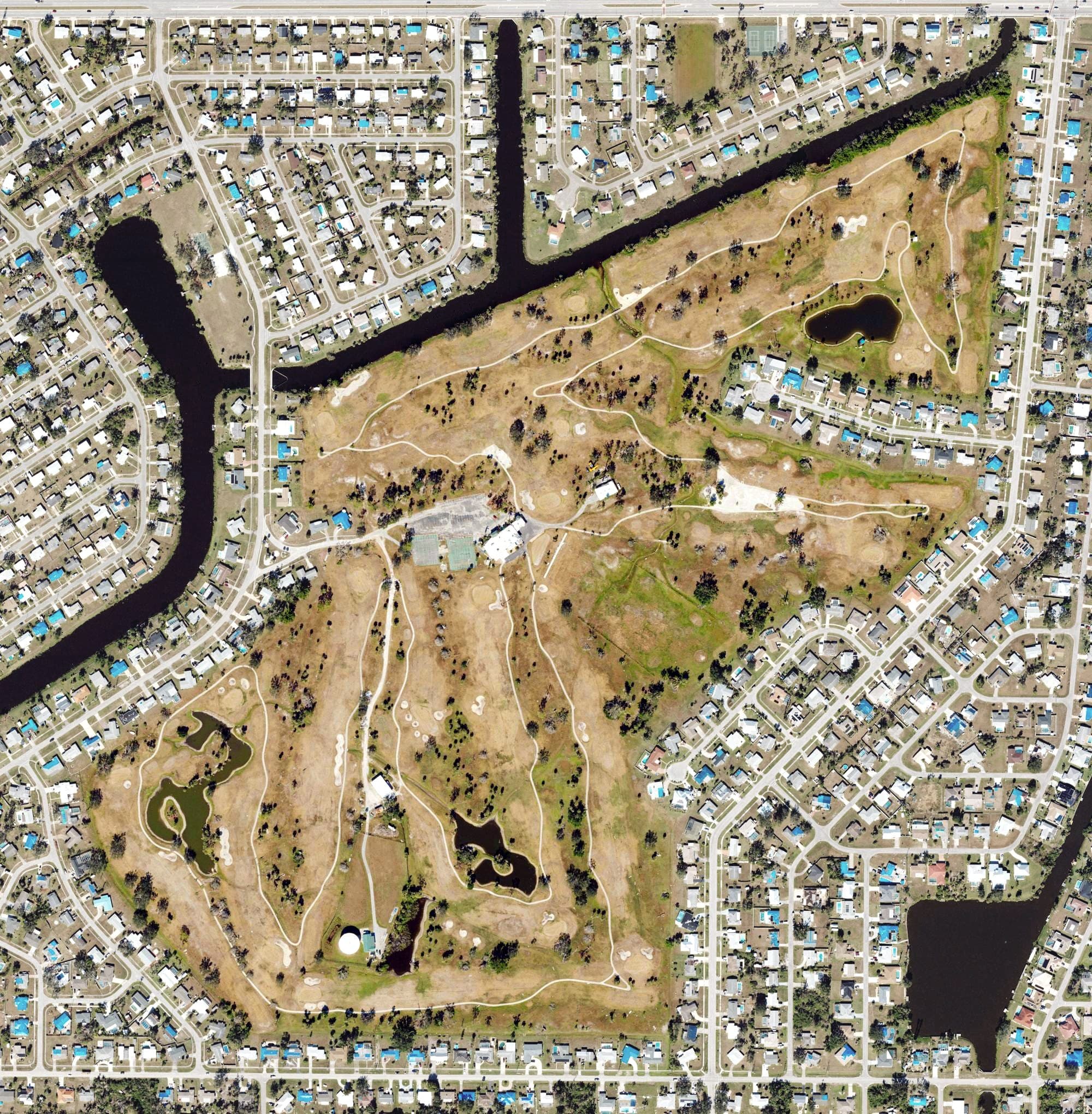 Aerial view of The Golf Links of Charlotte Harbor, FL, with its hole routing marked