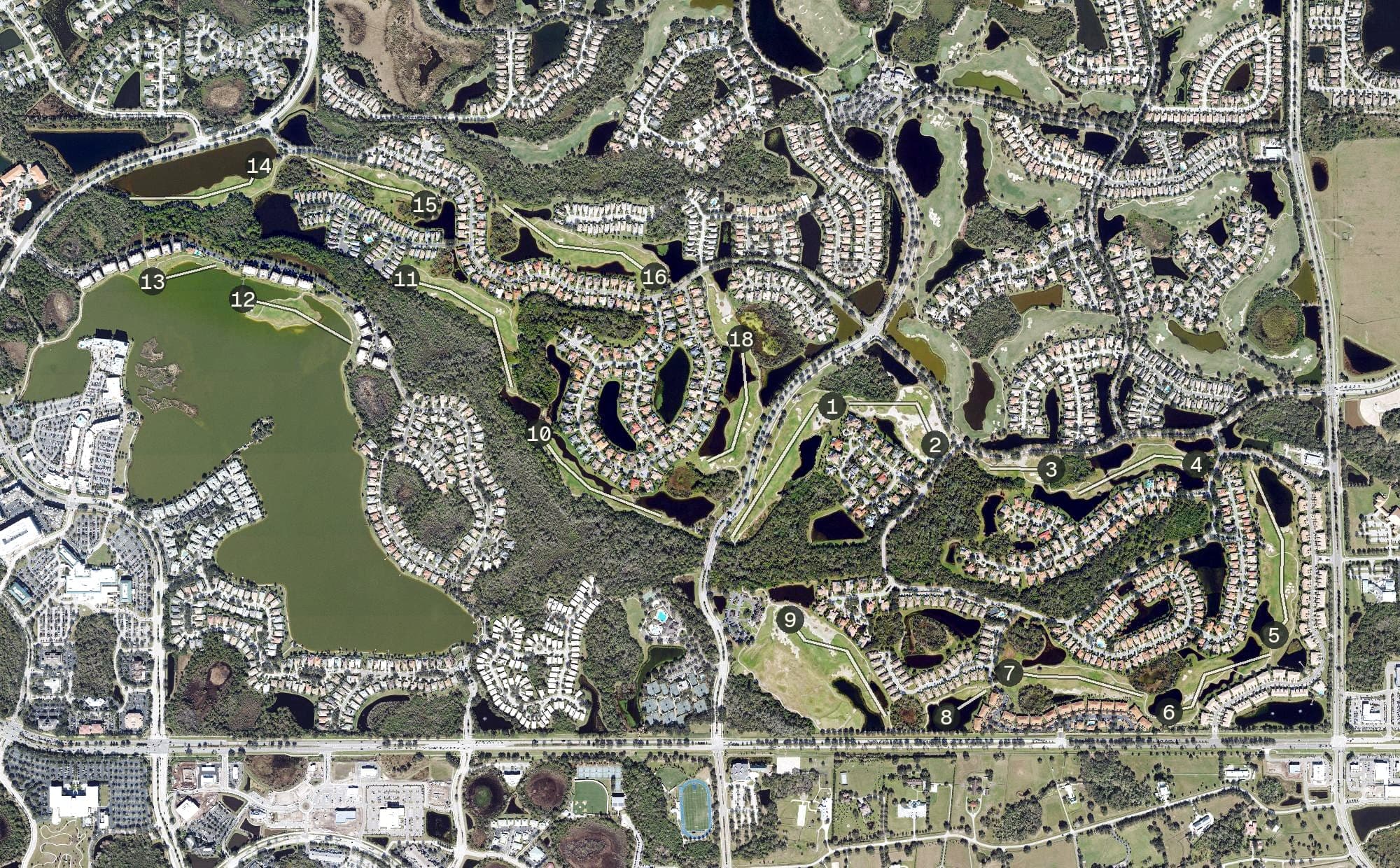 Aerial view of The Legacy Golf Course, FL, with its hole routing marked