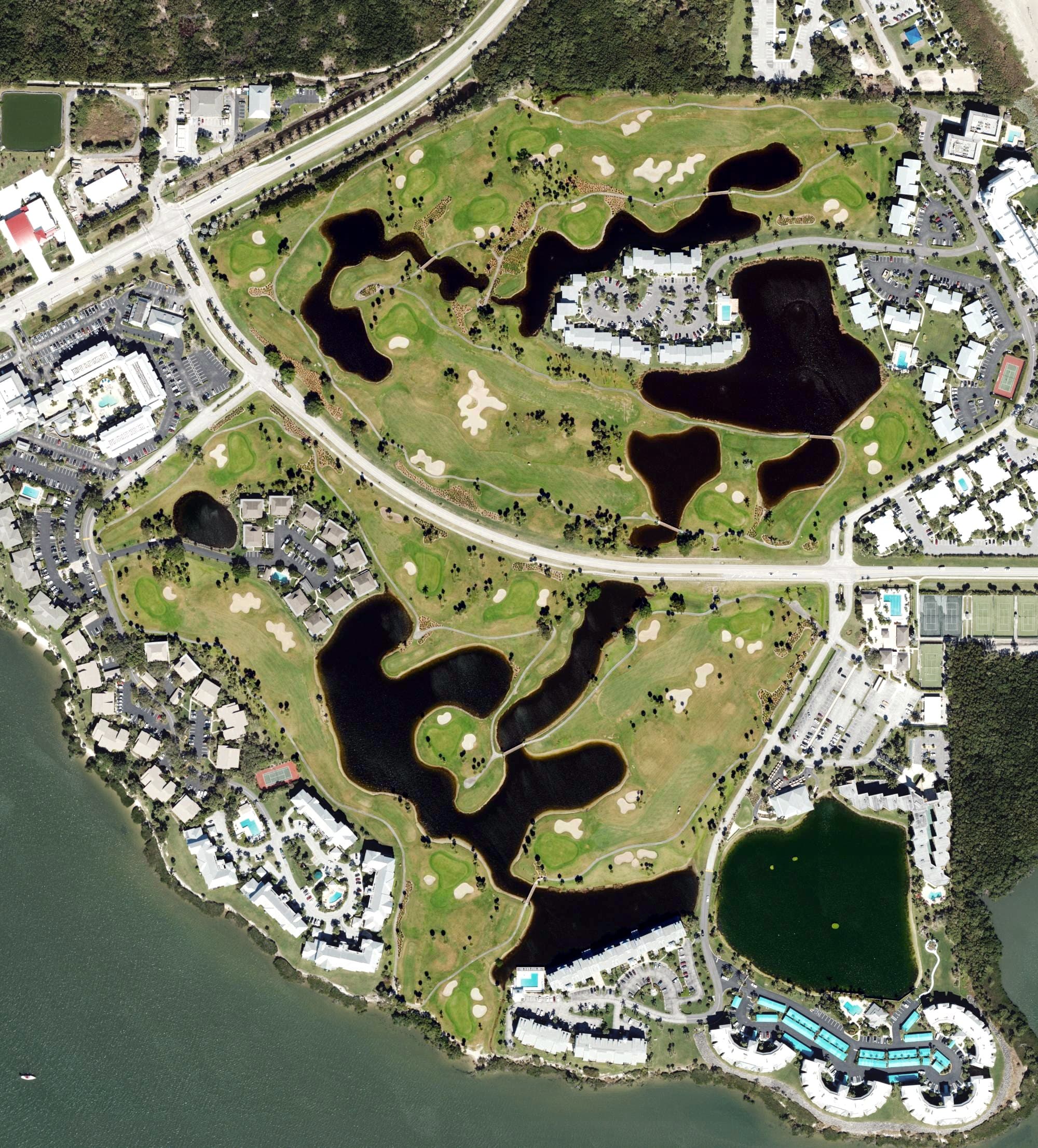 Aerial view of The Ocean Club at Hutchinson Island Marriott Beach Resort, FL, with its hole routing marked