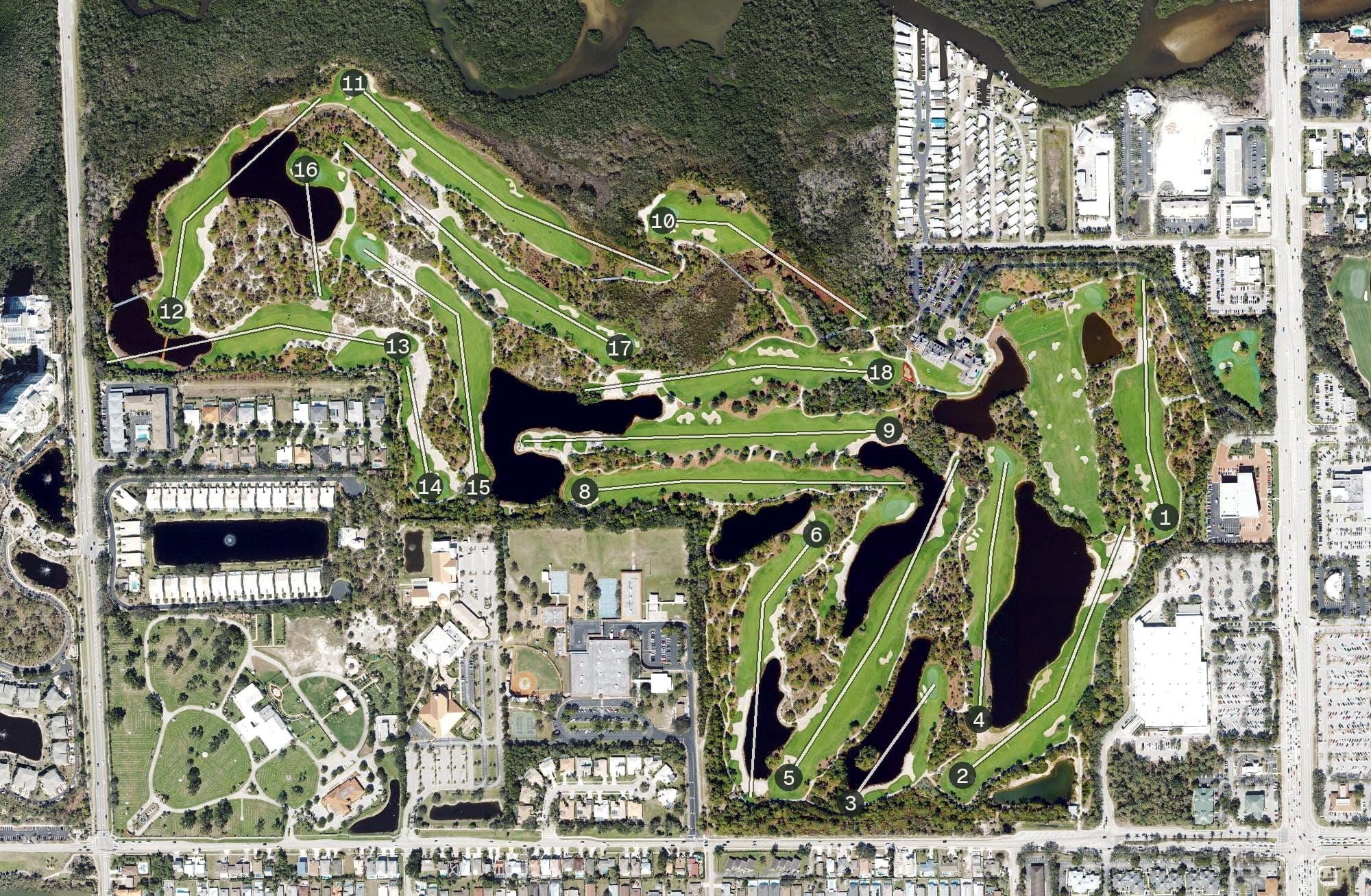 Aerial view of The Old Collier Golf Club, FL, with its hole routing marked