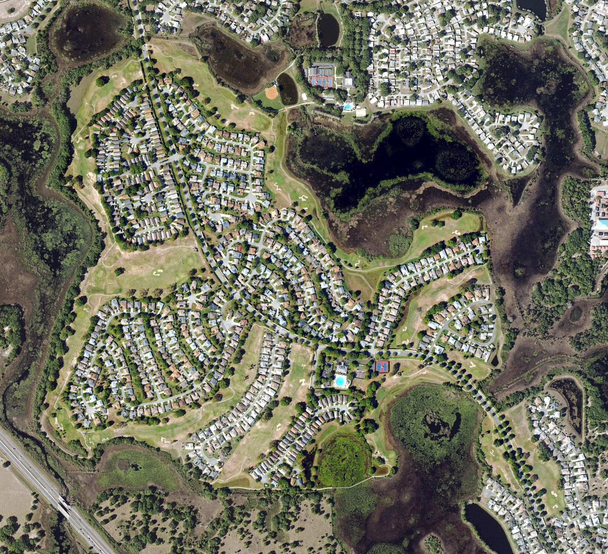 Aerial view of The Plantation Golf Club - Cranes Roost, FL, with its hole routing marked