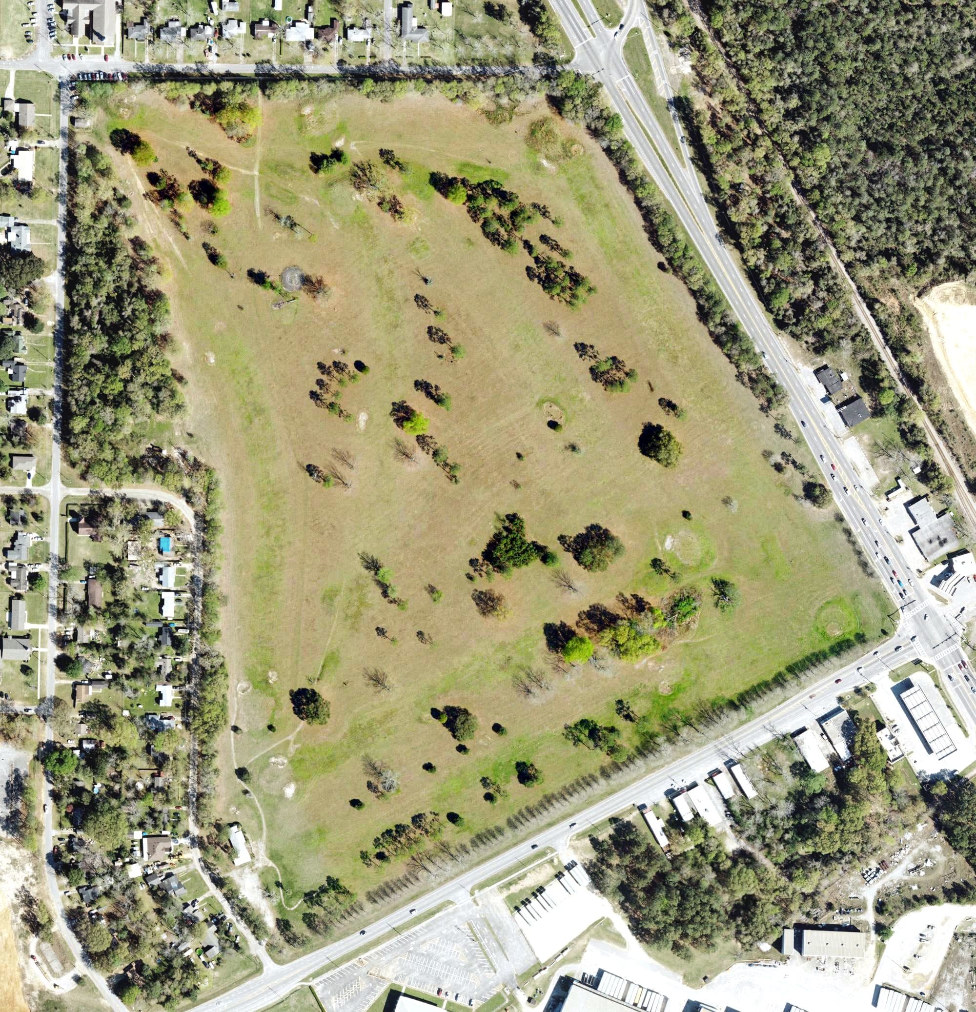 Aerial view of Timber Toss Disc Golf, FL, with its hole routing marked