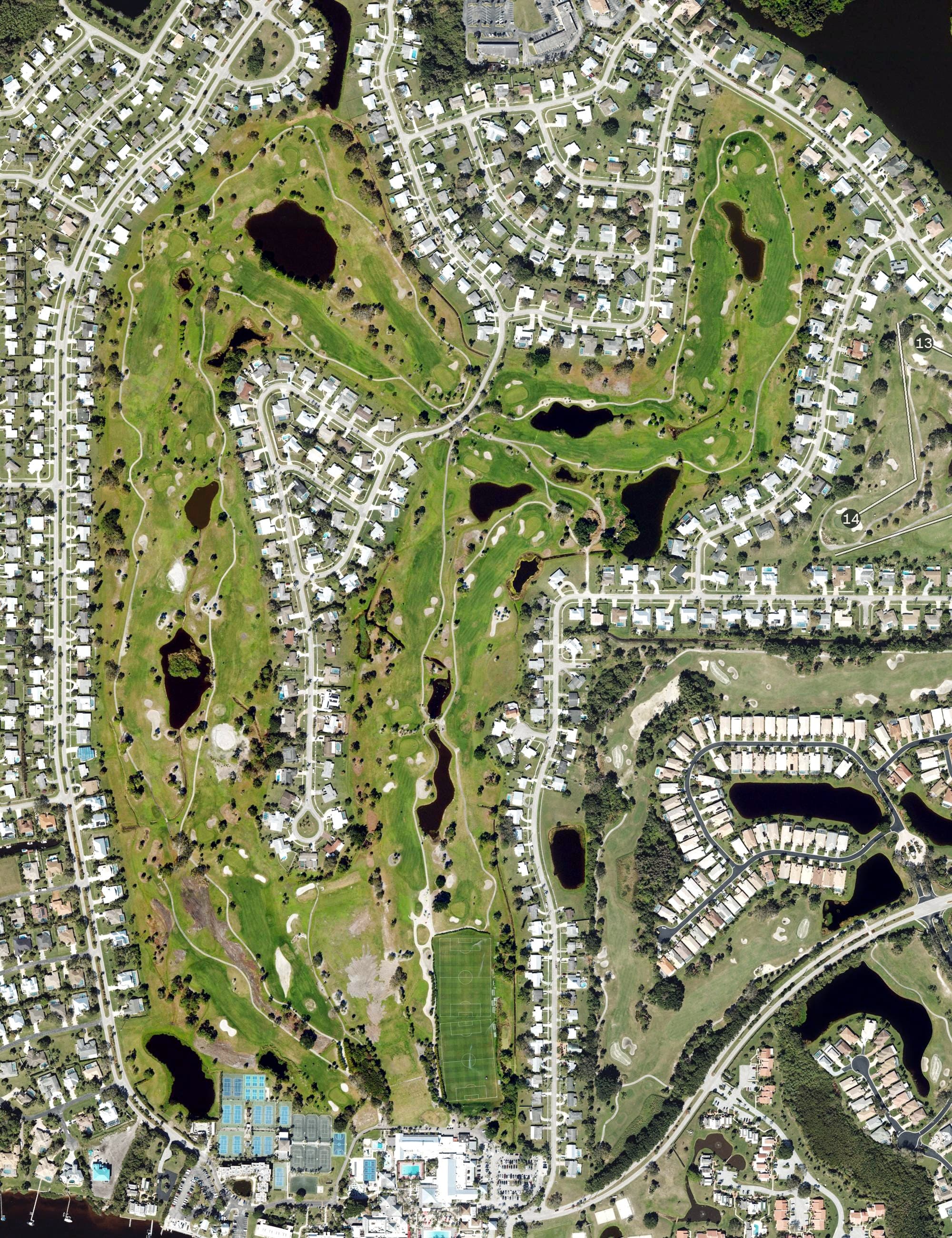 Aerial view of Trident Golf Club, FL, with its hole routing marked