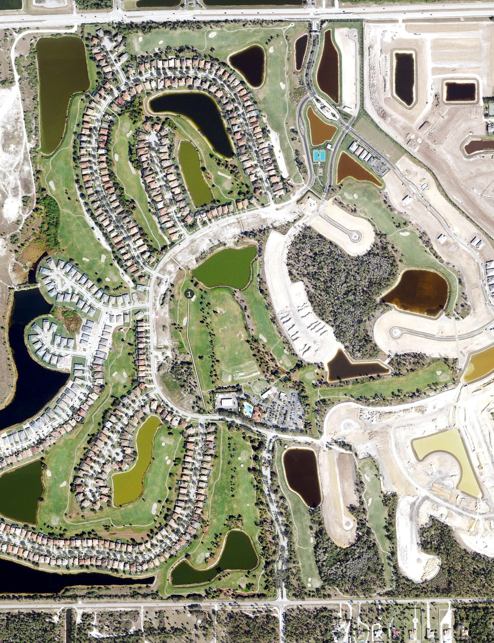 Aerial view of Valencia Golf & Country Club, FL, with its hole routing marked