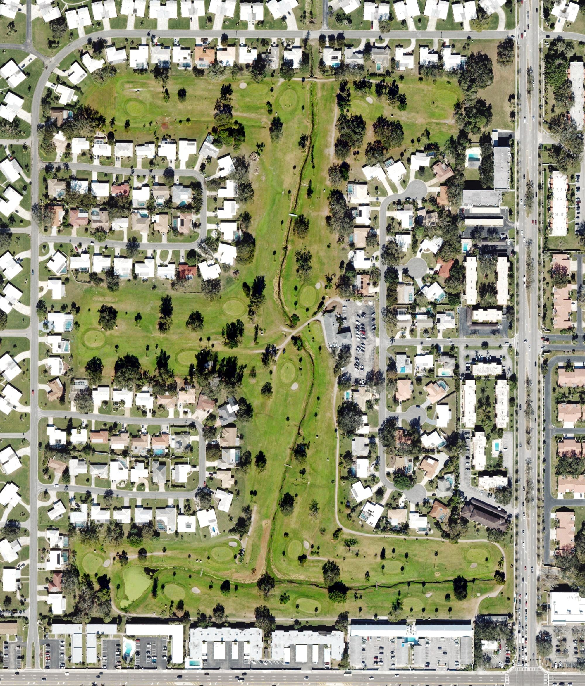 Aerial view of Village Green, FL, with its hole routing marked