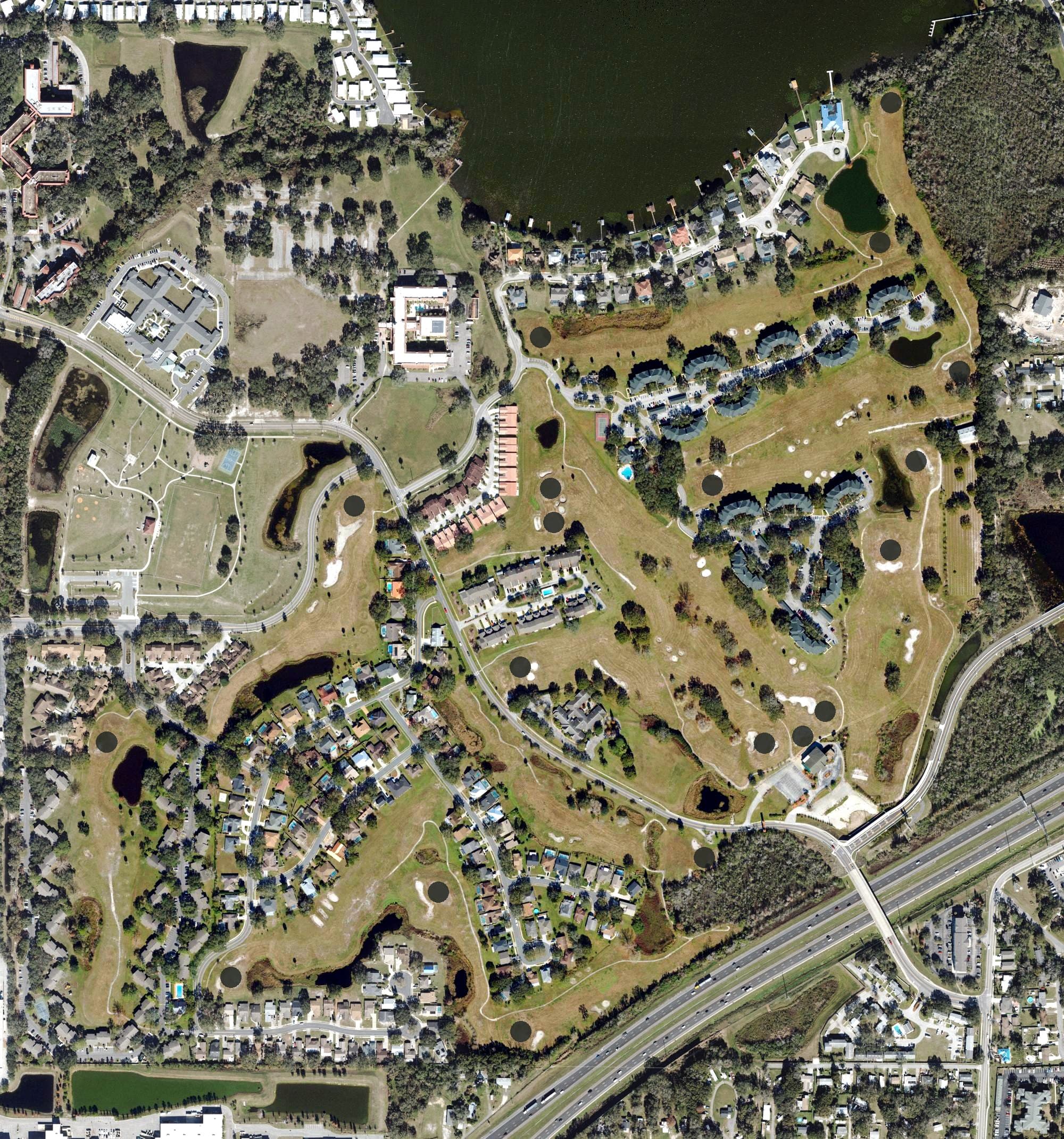 Aerial view of Wedgewood Golf and Country Club, FL, with its hole routing marked