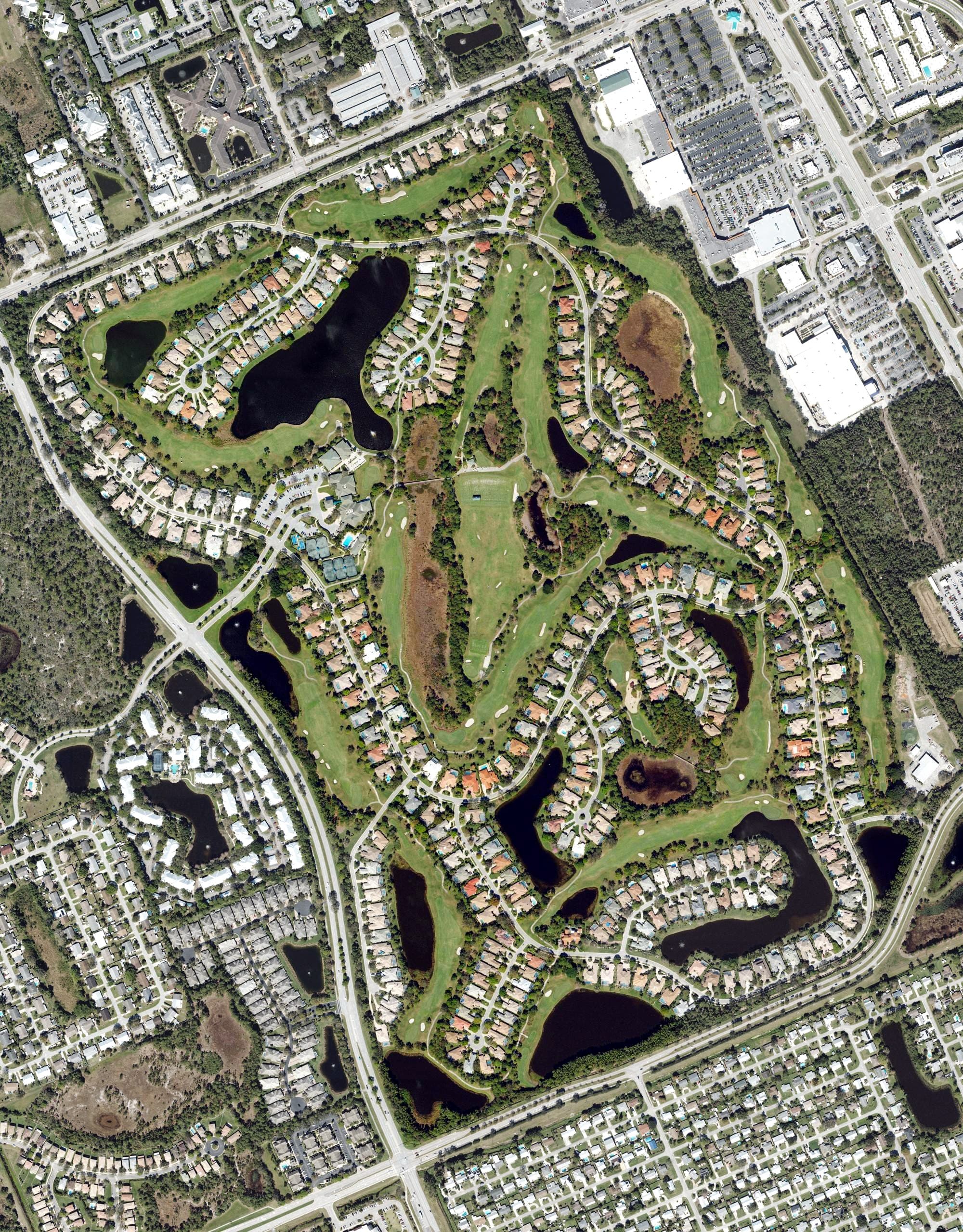 Aerial view of Willoughby Golf Club, FL, with its hole routing marked