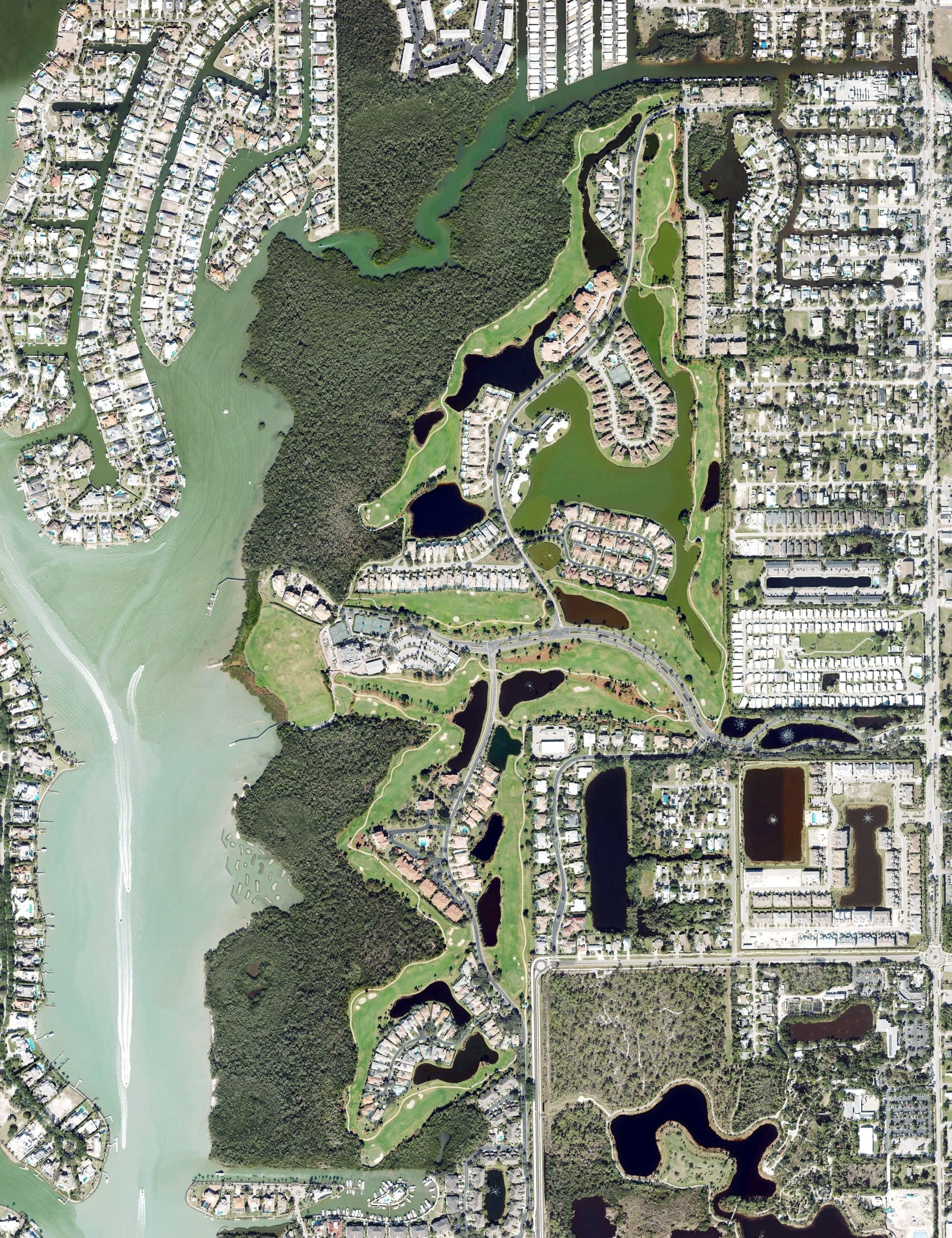 Aerial view of Windstar on Naples Bay, FL, with its hole routing marked