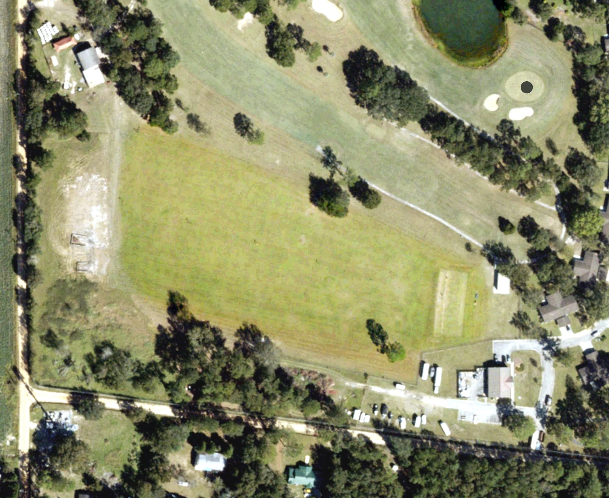 Aerial view of Driving Range, GA, with its hole routing marked