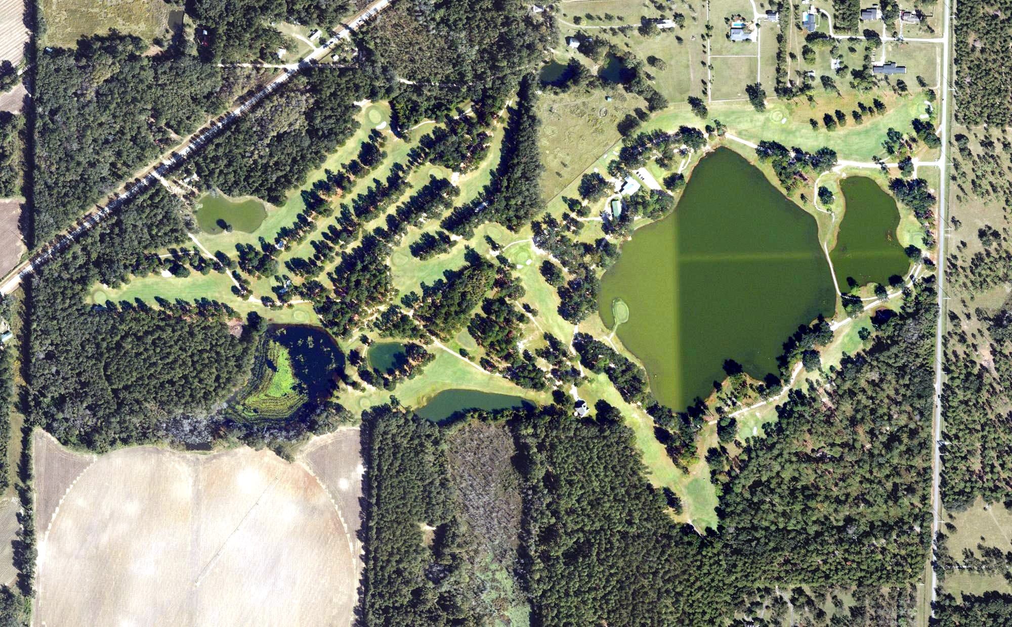Aerial view of Quitman Country Club, GA, with its hole routing marked