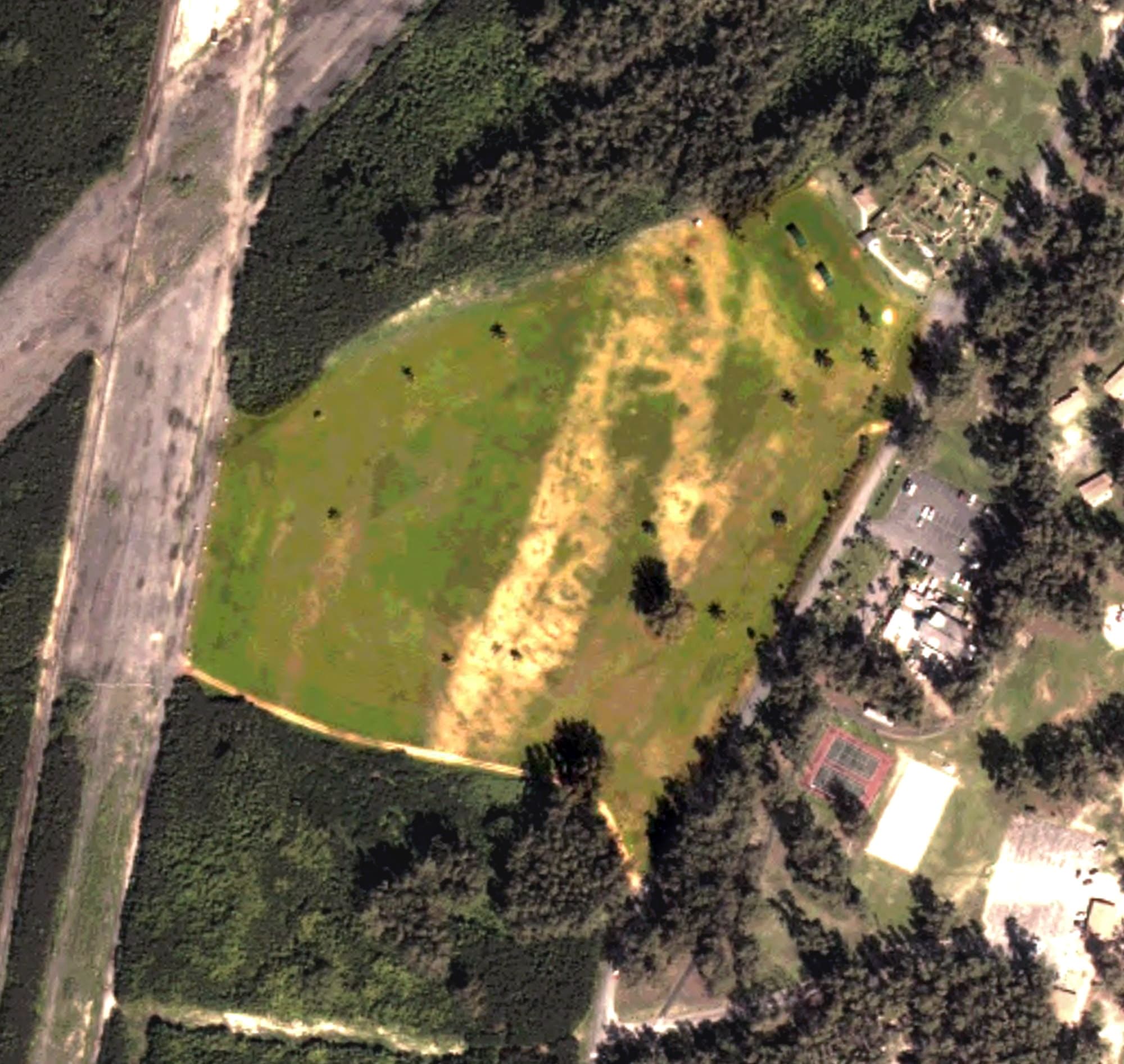 Aerial view of Bellows Golf Course, HI, with its hole routing marked