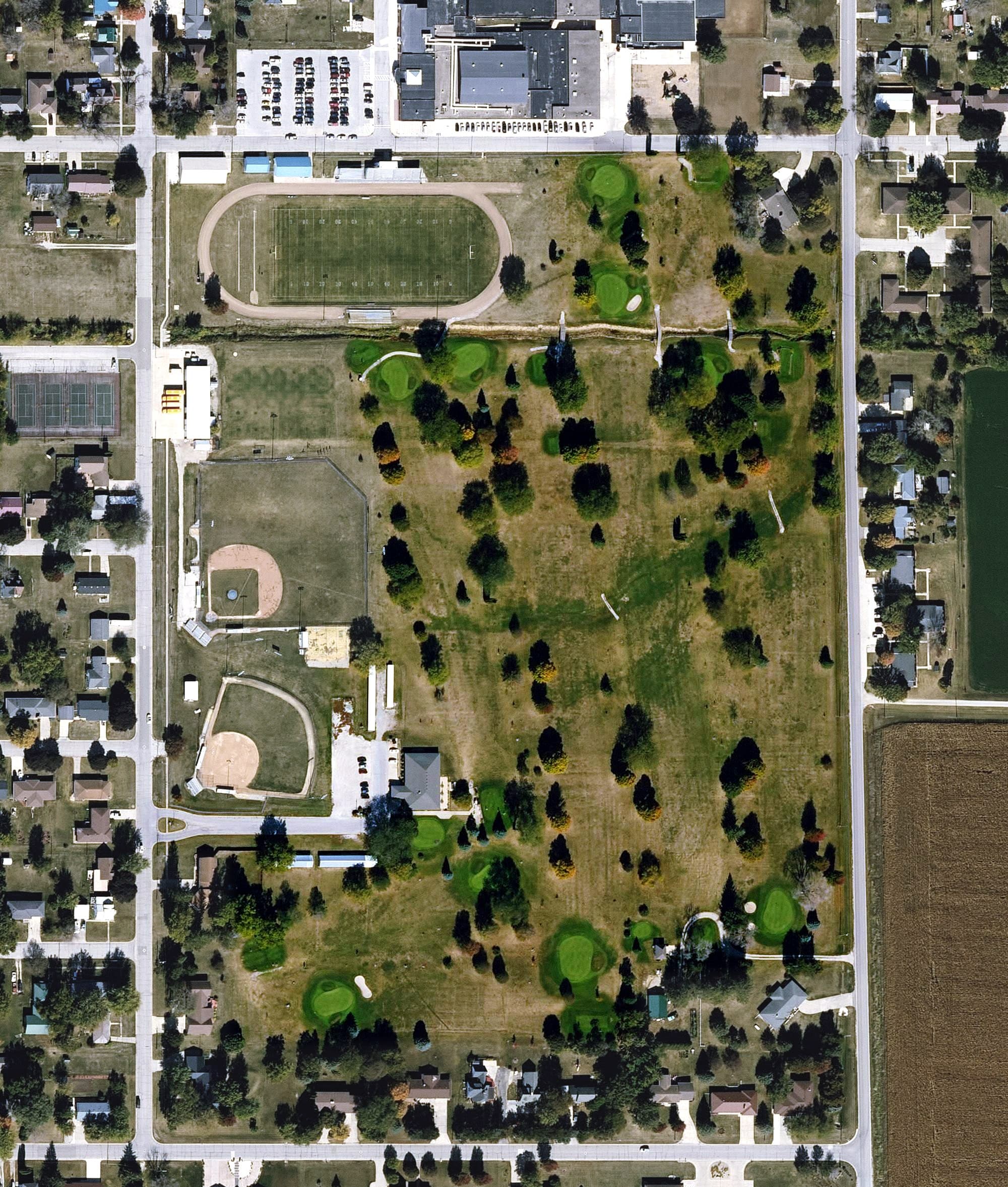 Aerial view of Ackley Country Club, IA, with its hole routing marked
