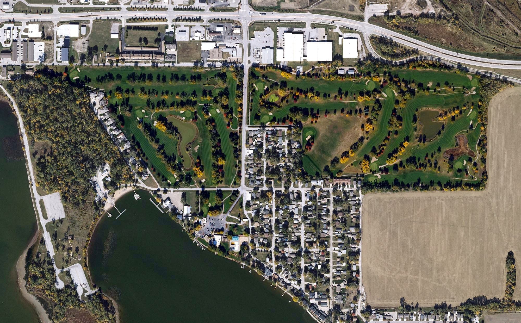 Aerial view of Council Bluffs Country Club, IA, with its hole routing marked