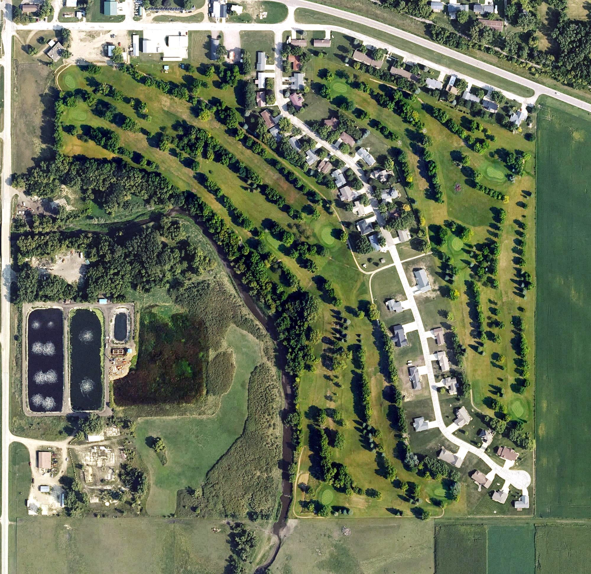 Aerial view of Country Greens Golf Course, IA, with its hole routing marked