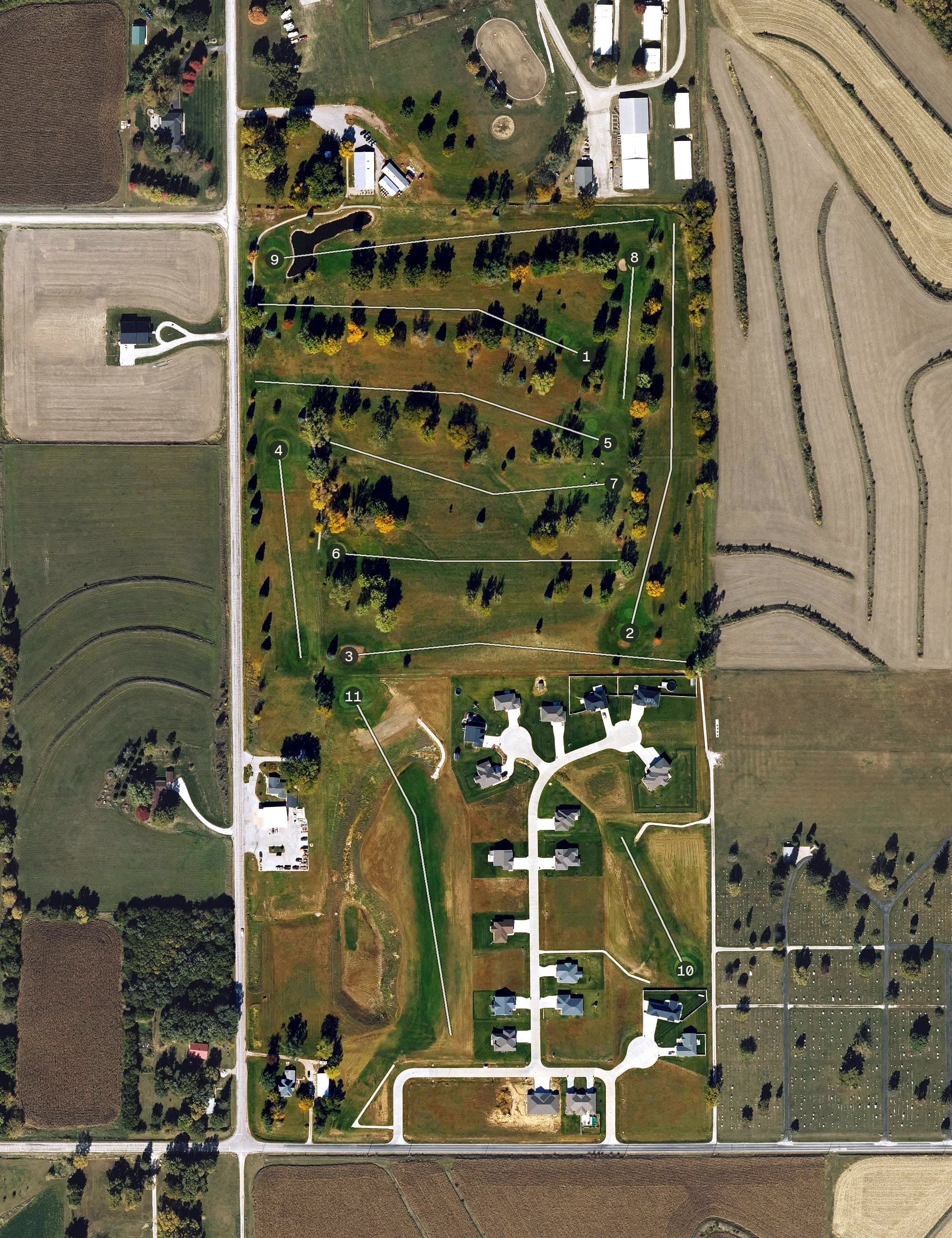 Aerial view of Fairview Country Club, IA, with its hole routing marked