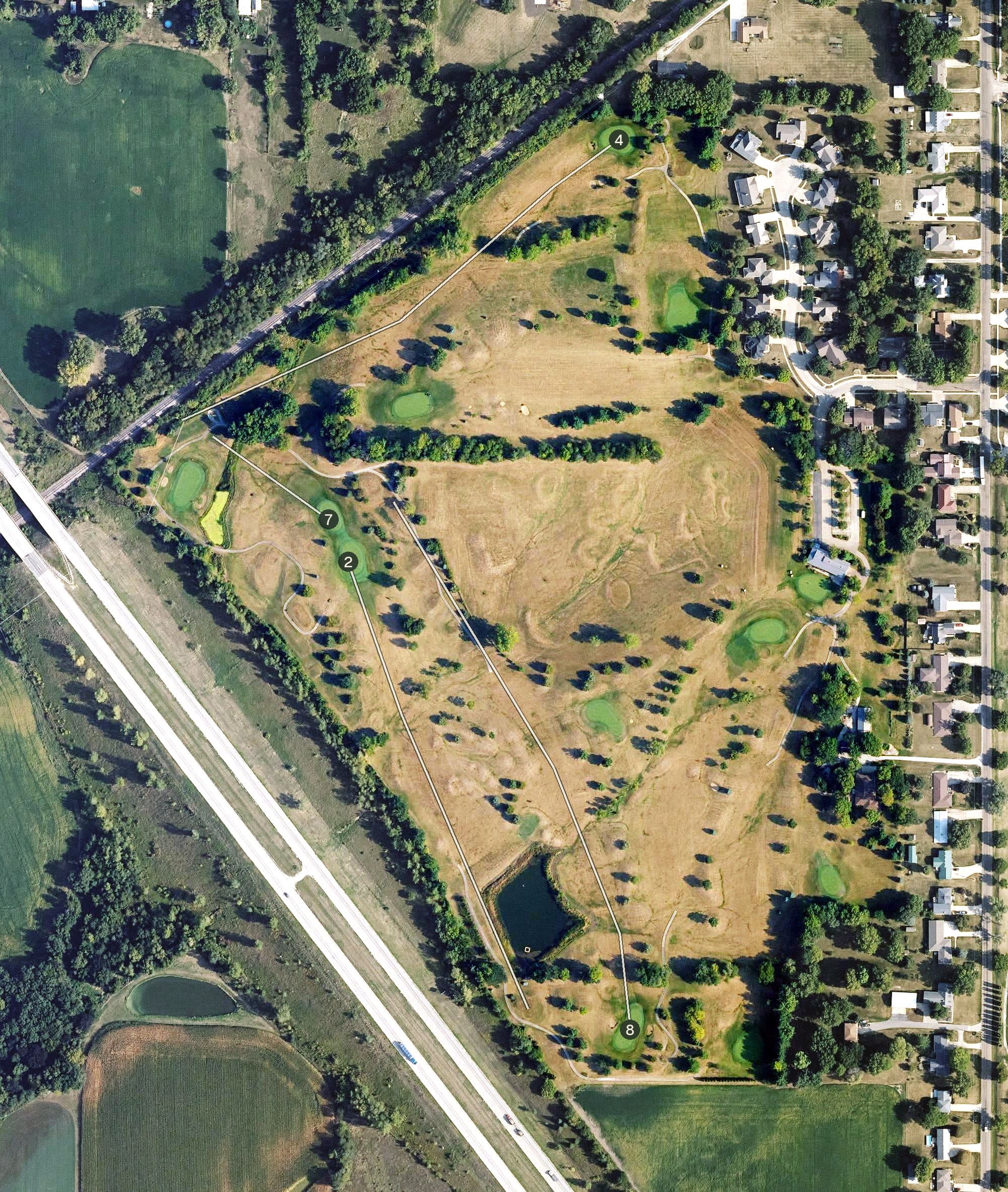 Aerial view of Harvest Point Golf Course, IA, with its hole routing marked