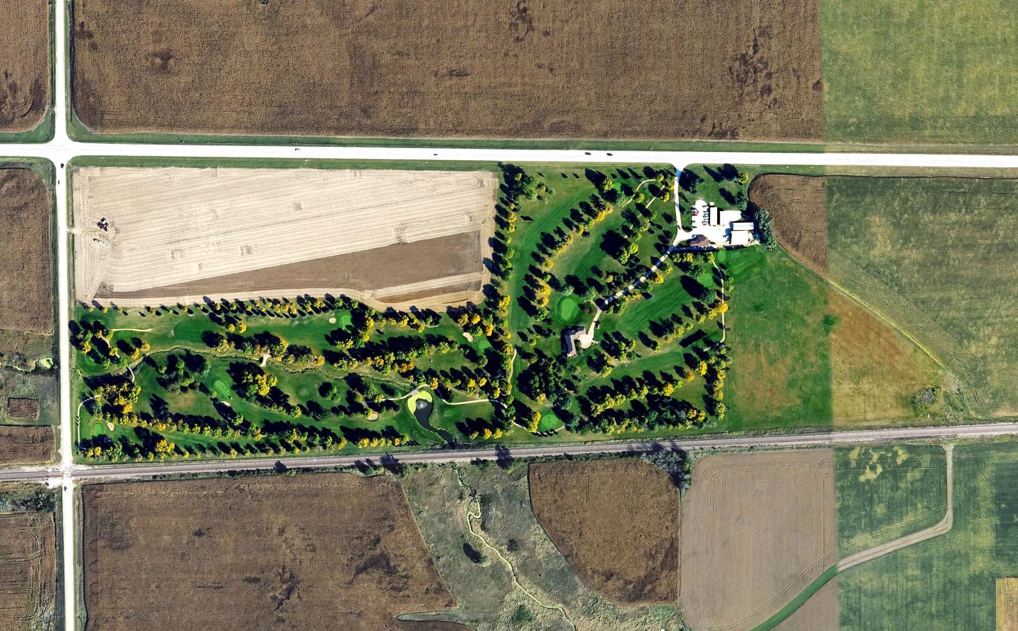 Aerial view of Hill Golf Course, IA, with its hole routing marked
