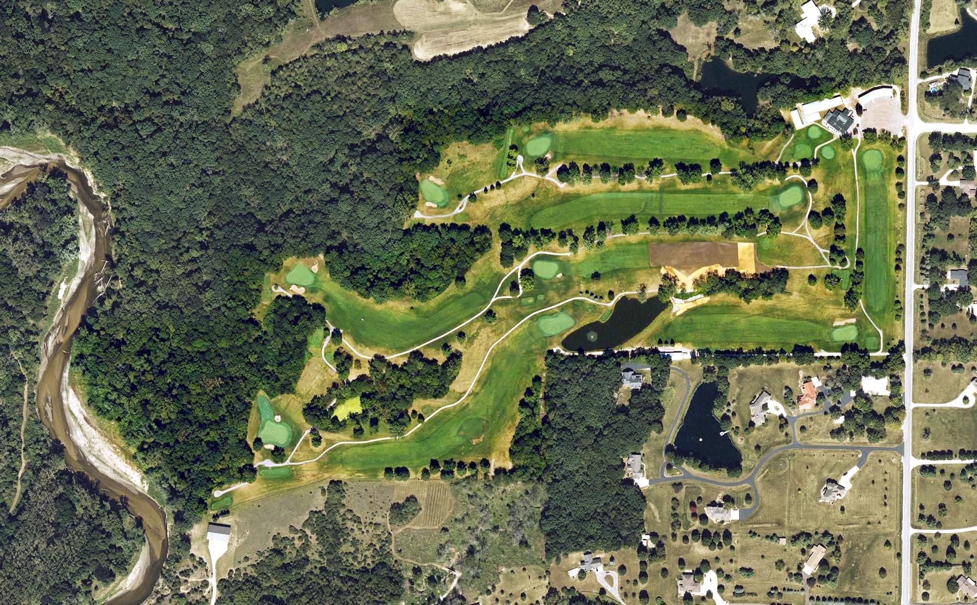 Aerial view of Hillcrest Country Club of Dallas County, IA, with its hole routing marked