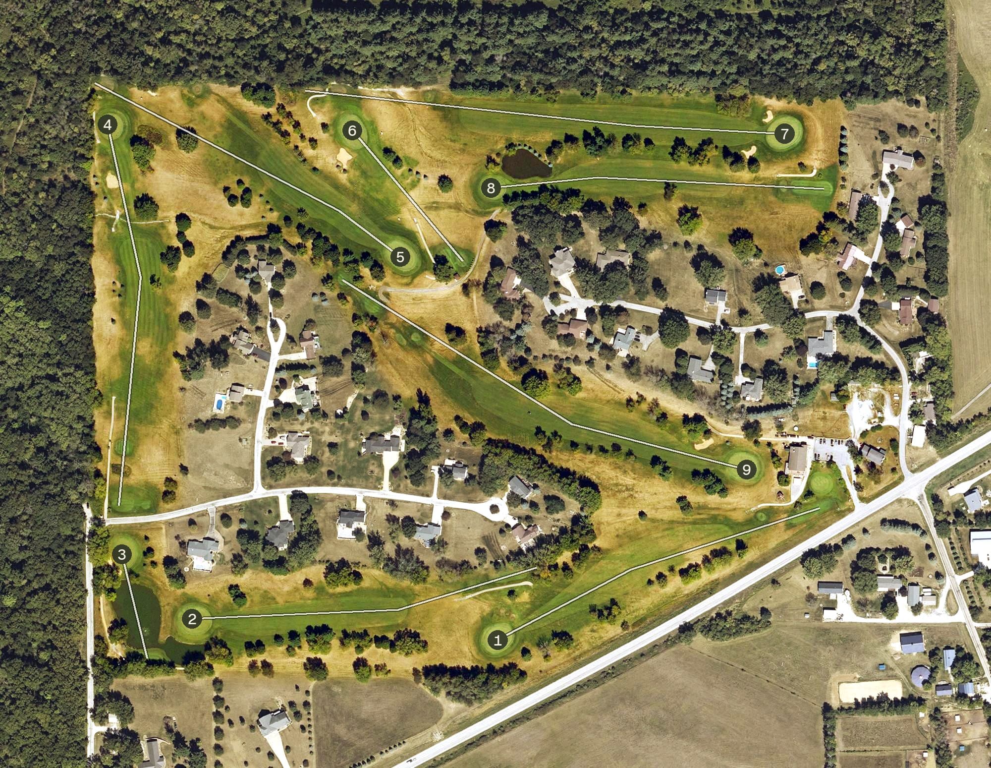 Aerial view of Lake MacBride Golf Course, IA, with its hole routing marked