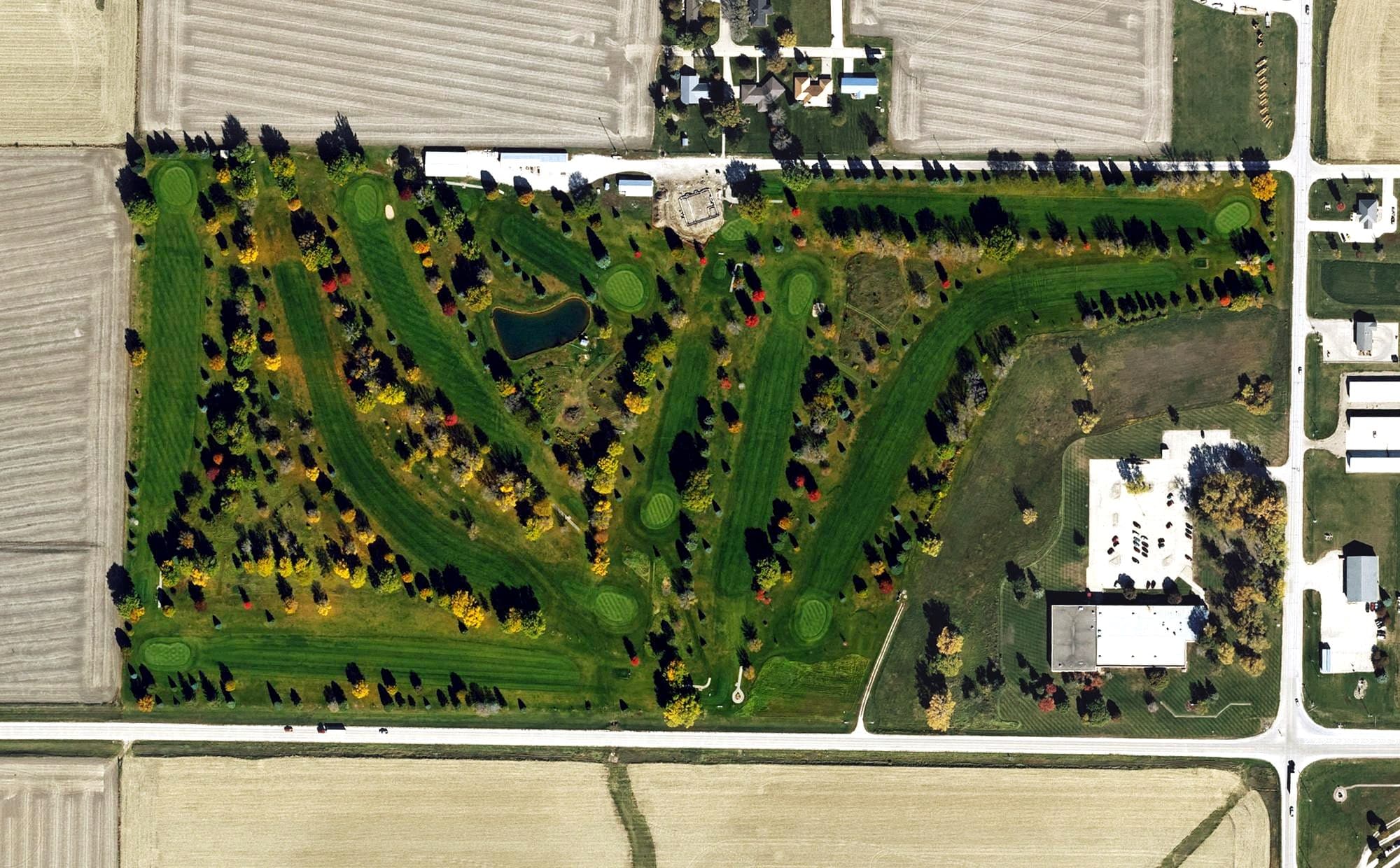 Aerial view of Marcus Community Golf Club, IA, with its hole routing marked