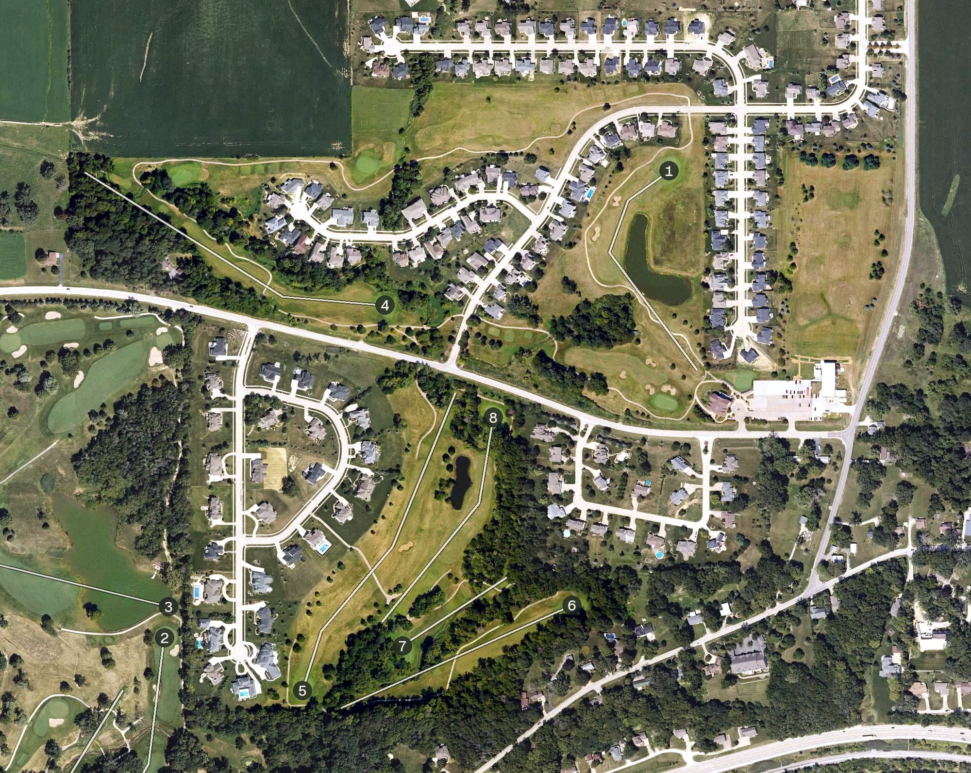 Aerial view of Pebble Creek Golf Course, IA, with its hole routing marked