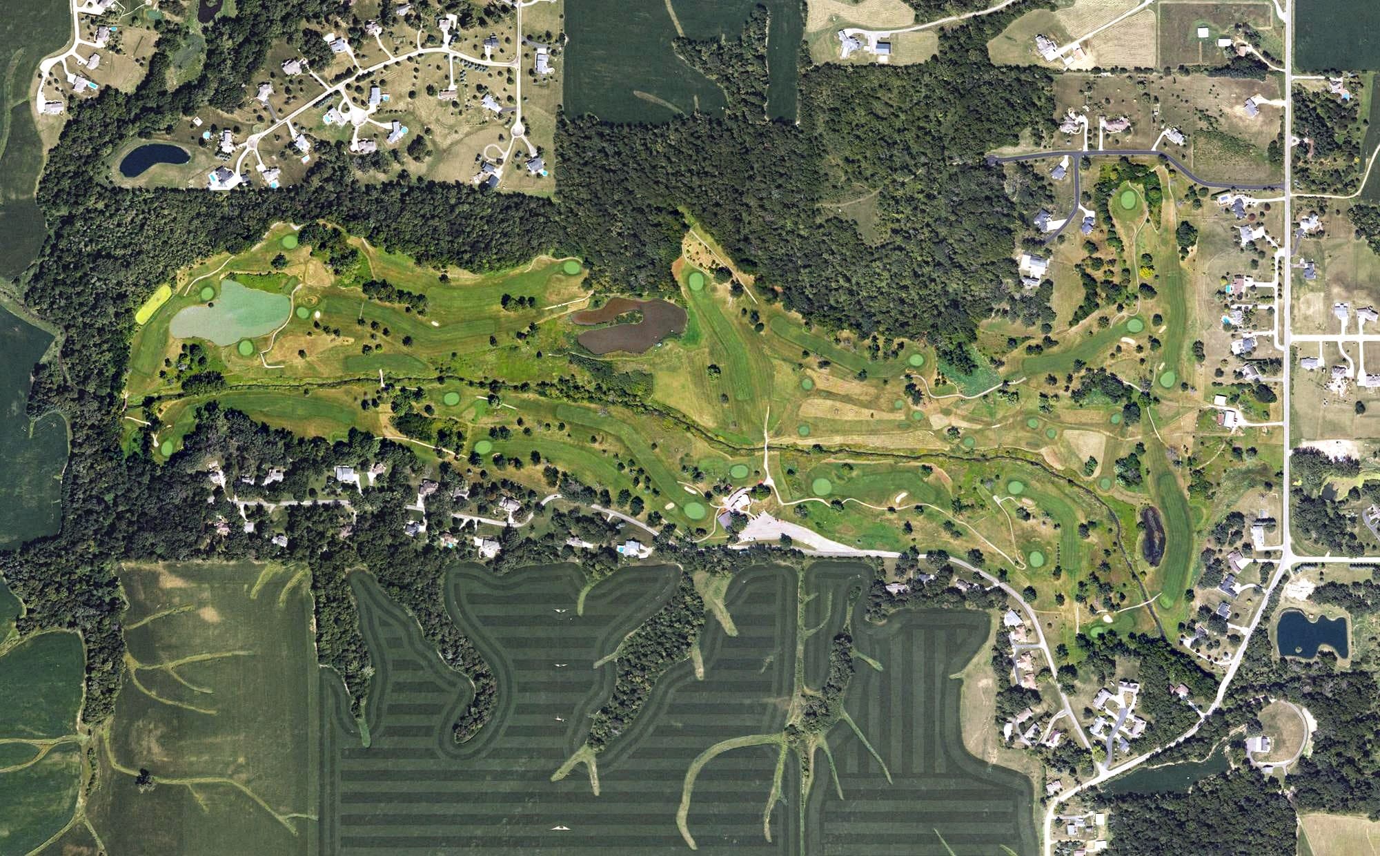 Aerial view of The Oaks Golf Course, IA, with its hole routing marked
