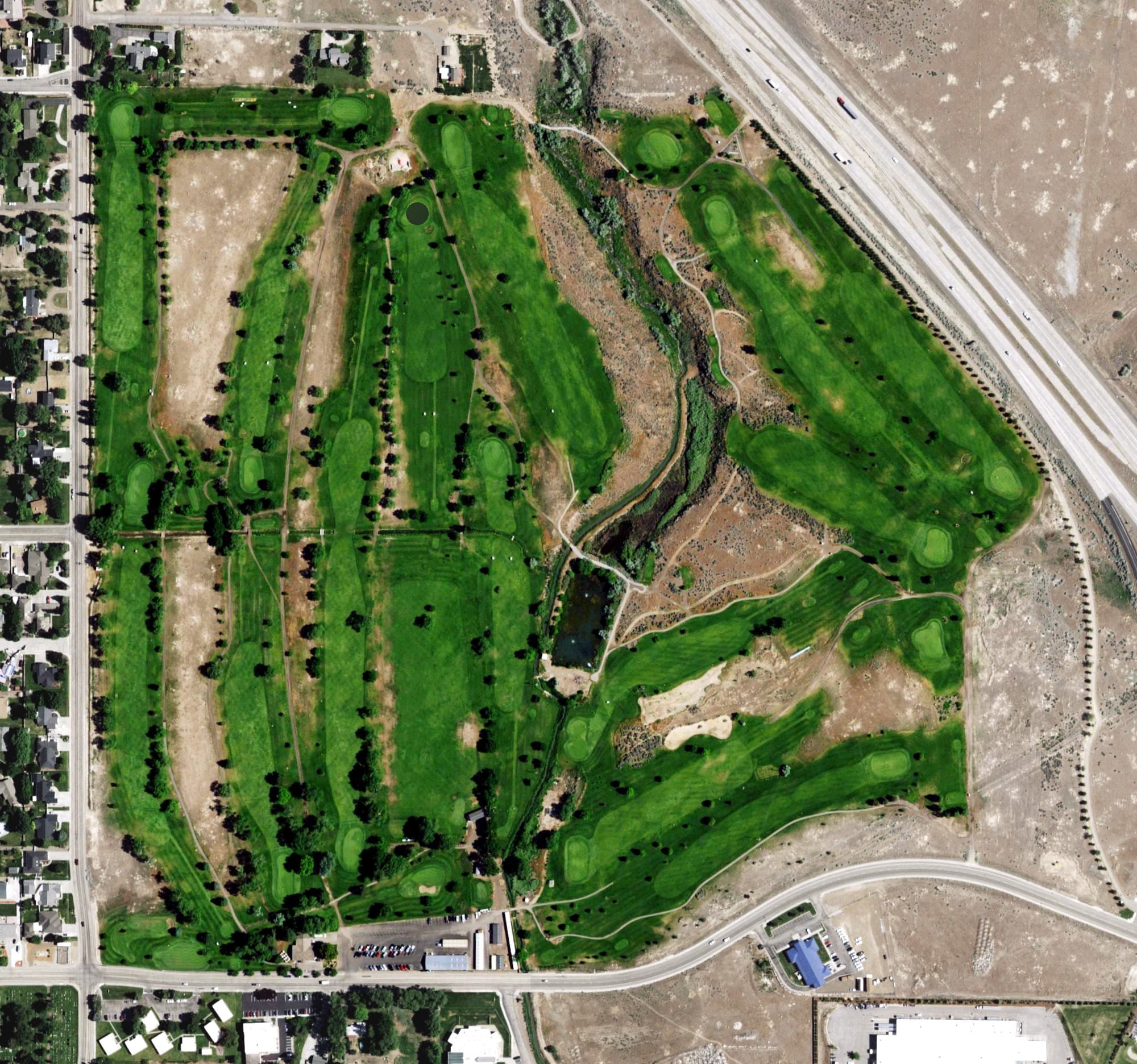Aerial view of Mountain Home Golf Course, ID, with its hole routing marked