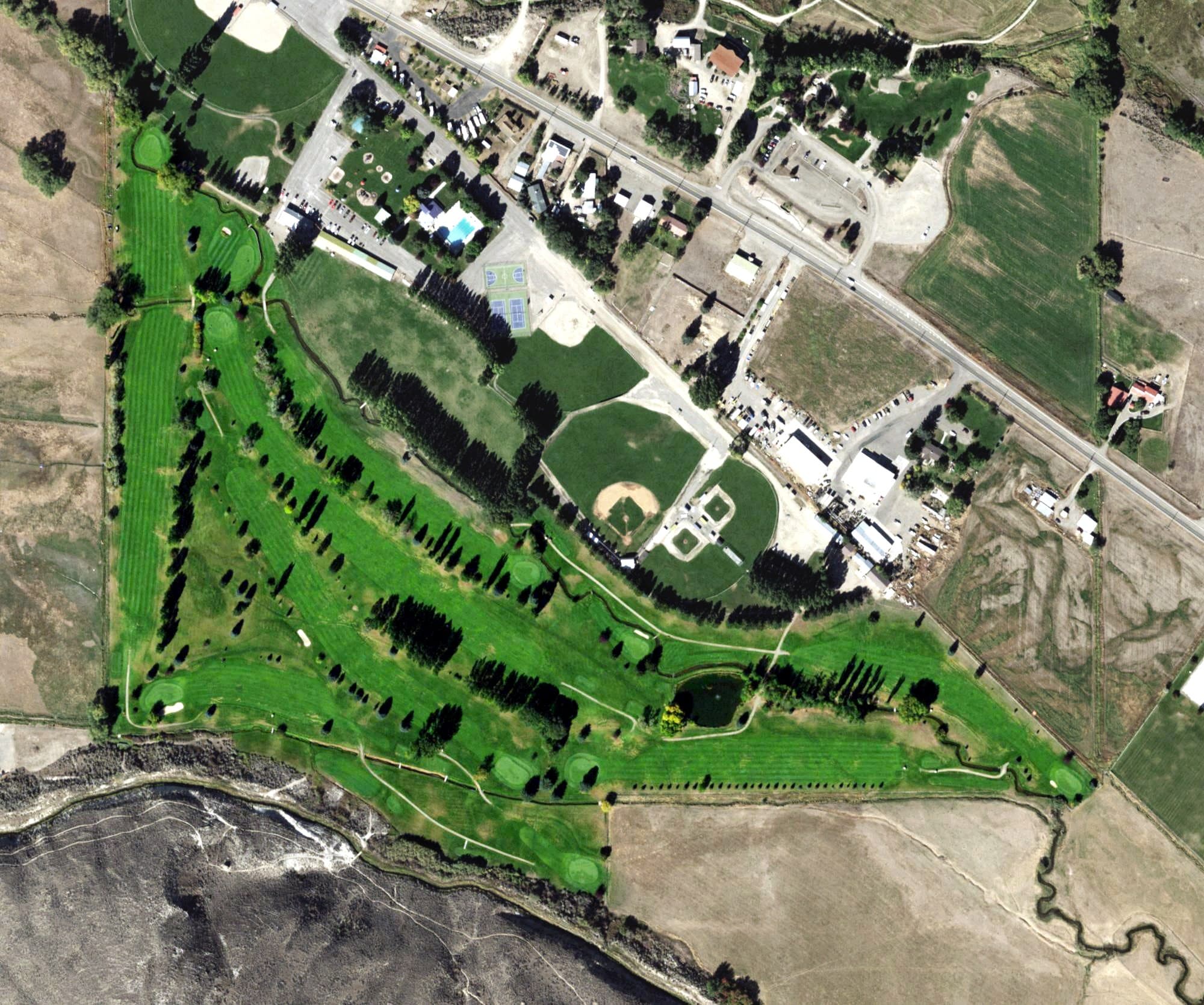 Aerial view of Salmon Valley Golf Course, ID, with its hole routing marked