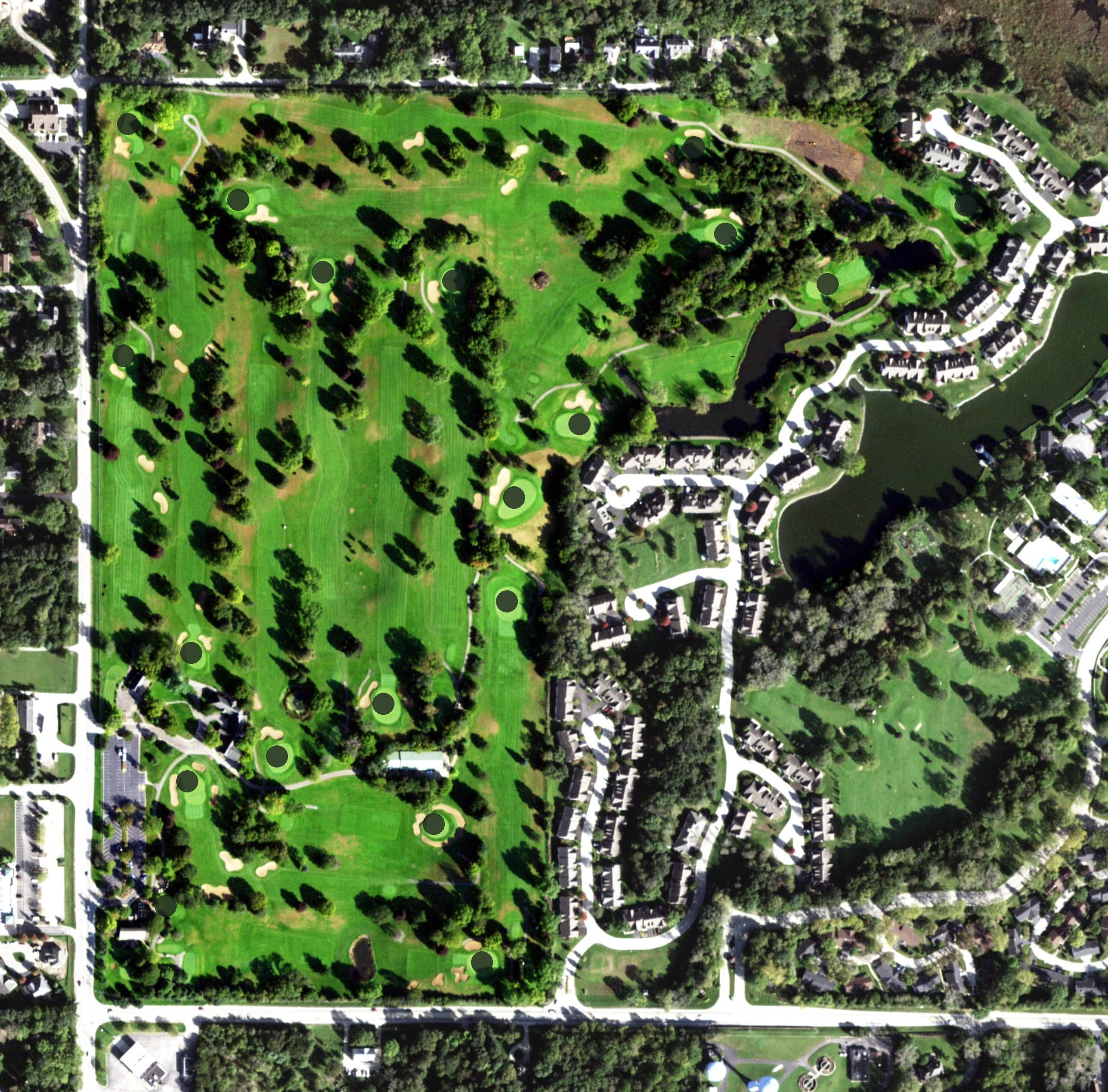 Aerial view of Fox Lake Country Club, IL, with its hole routing marked