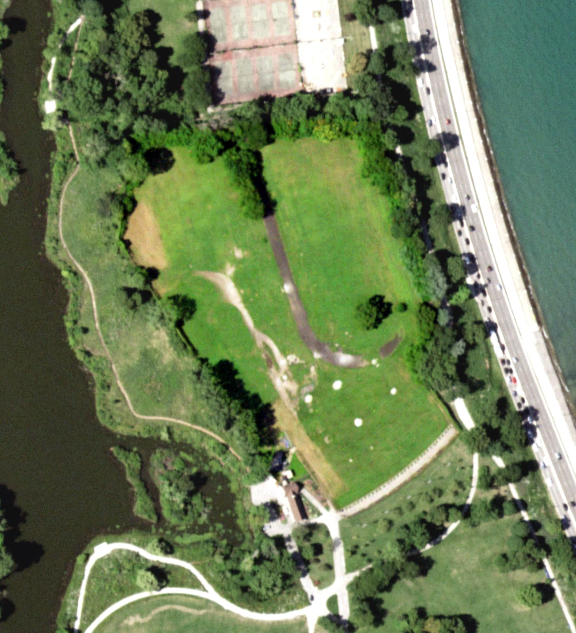 Aerial view of Jackson Park Driving Range, IL, with its hole routing marked