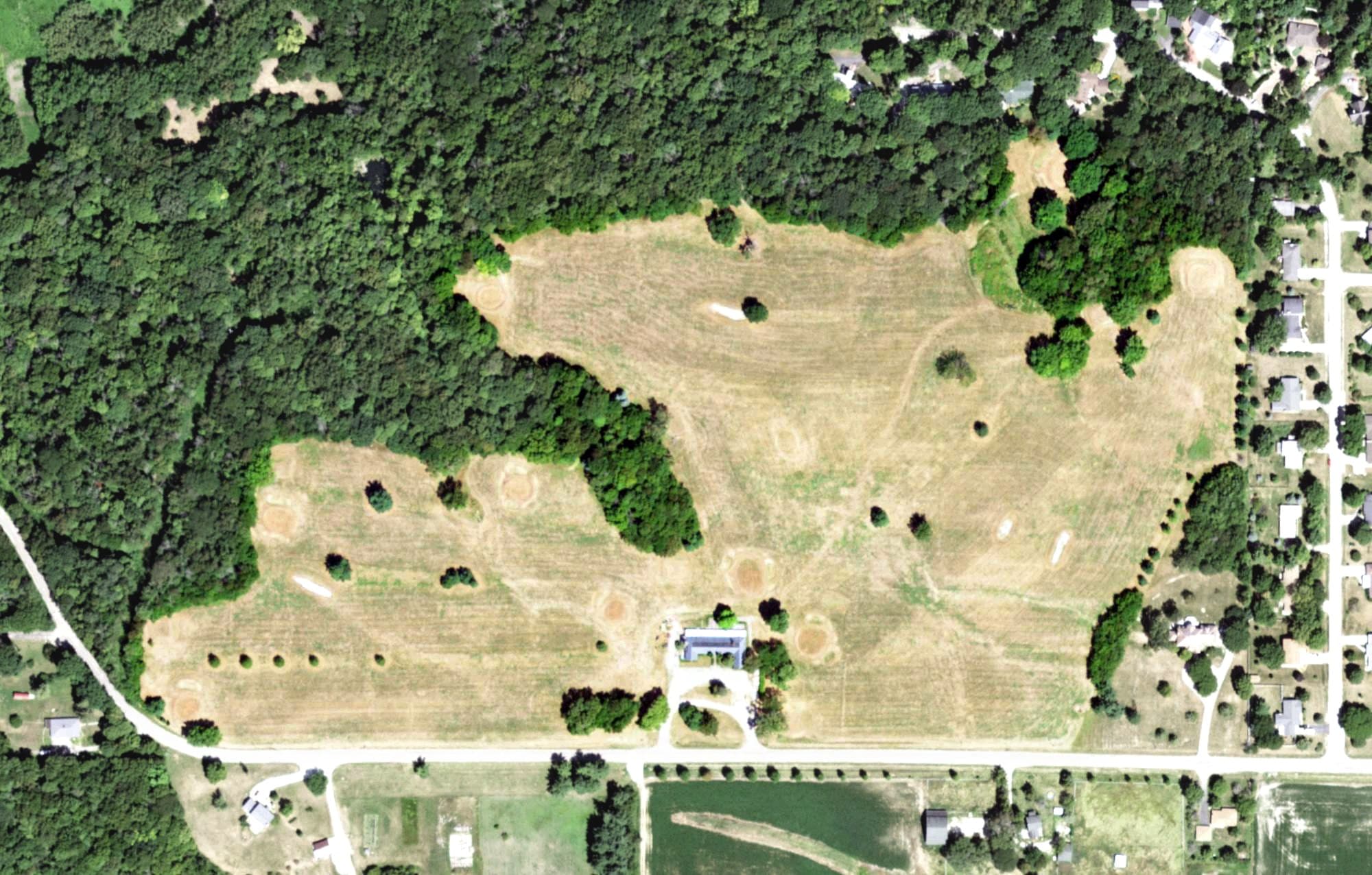 Aerial view of South Bluff Country Club, IL, with its hole routing marked