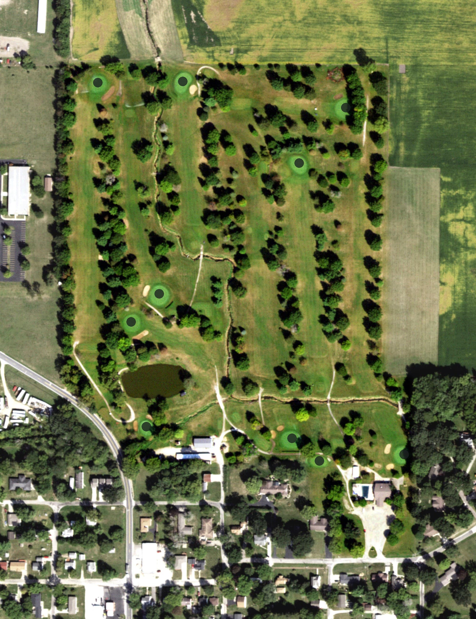 Aerial view of Woodlawn Country Club, IL, with its hole routing marked