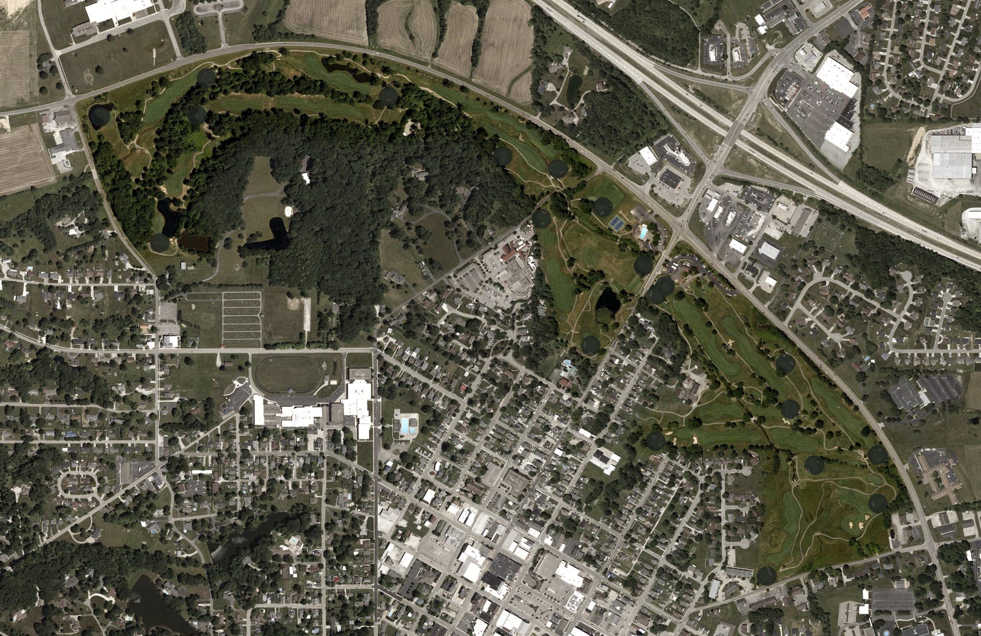 Aerial view of Hillcrest Golf & Country Club, IN, with its hole routing marked