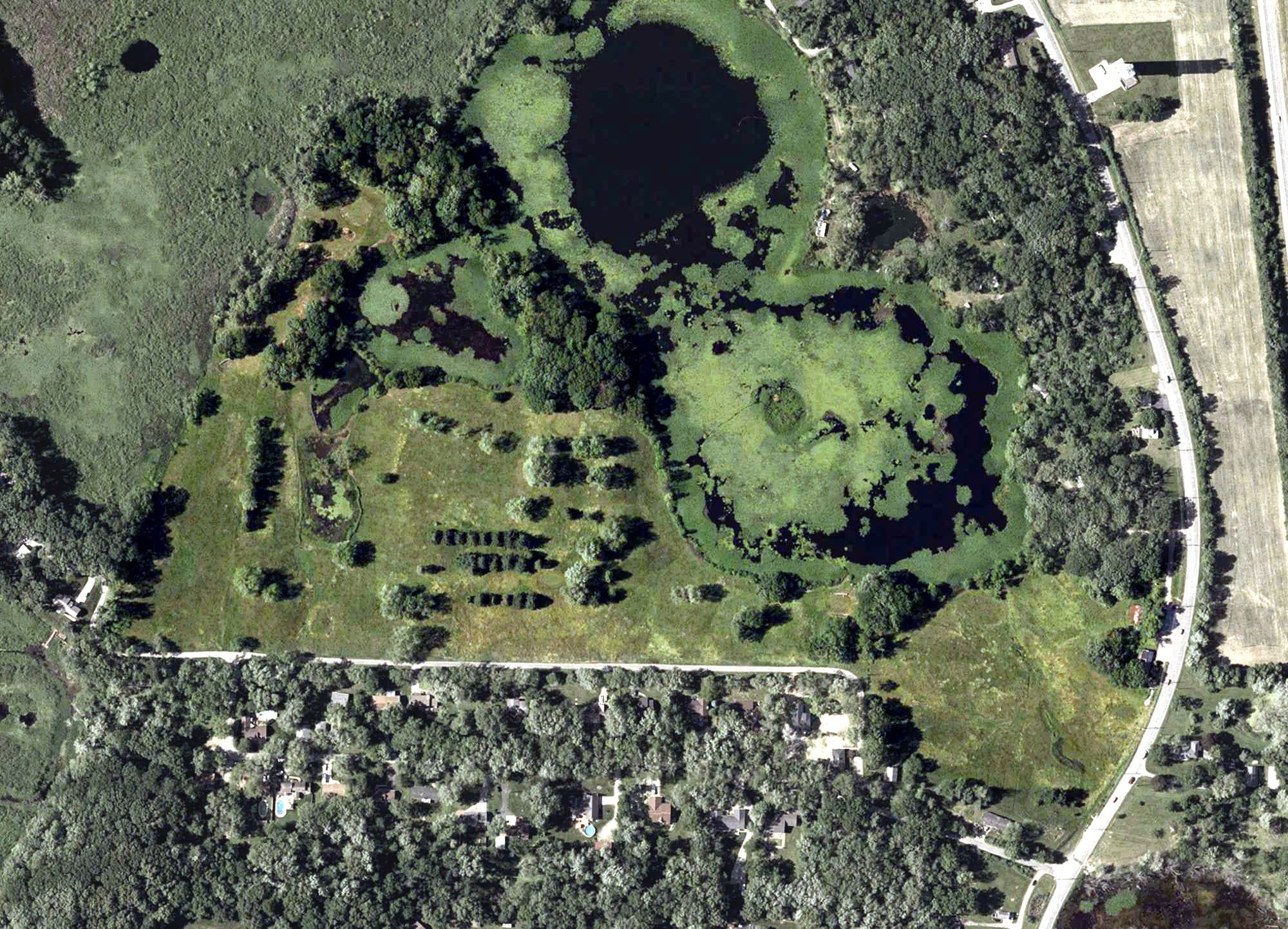 Aerial view of Mink Lake Golf Course, IN, with its hole routing marked