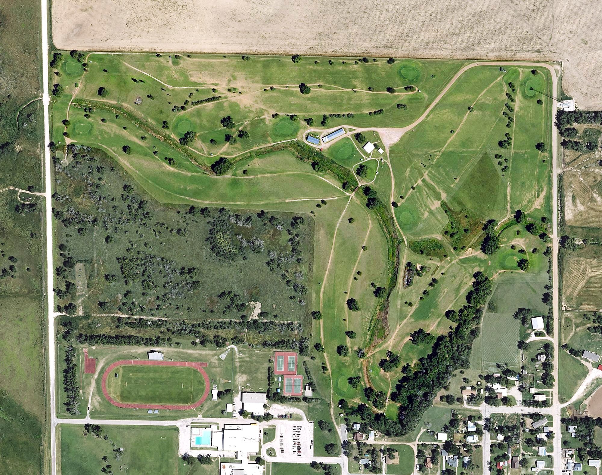 Aerial view of Ashland Golf Course, KS, with its hole routing marked