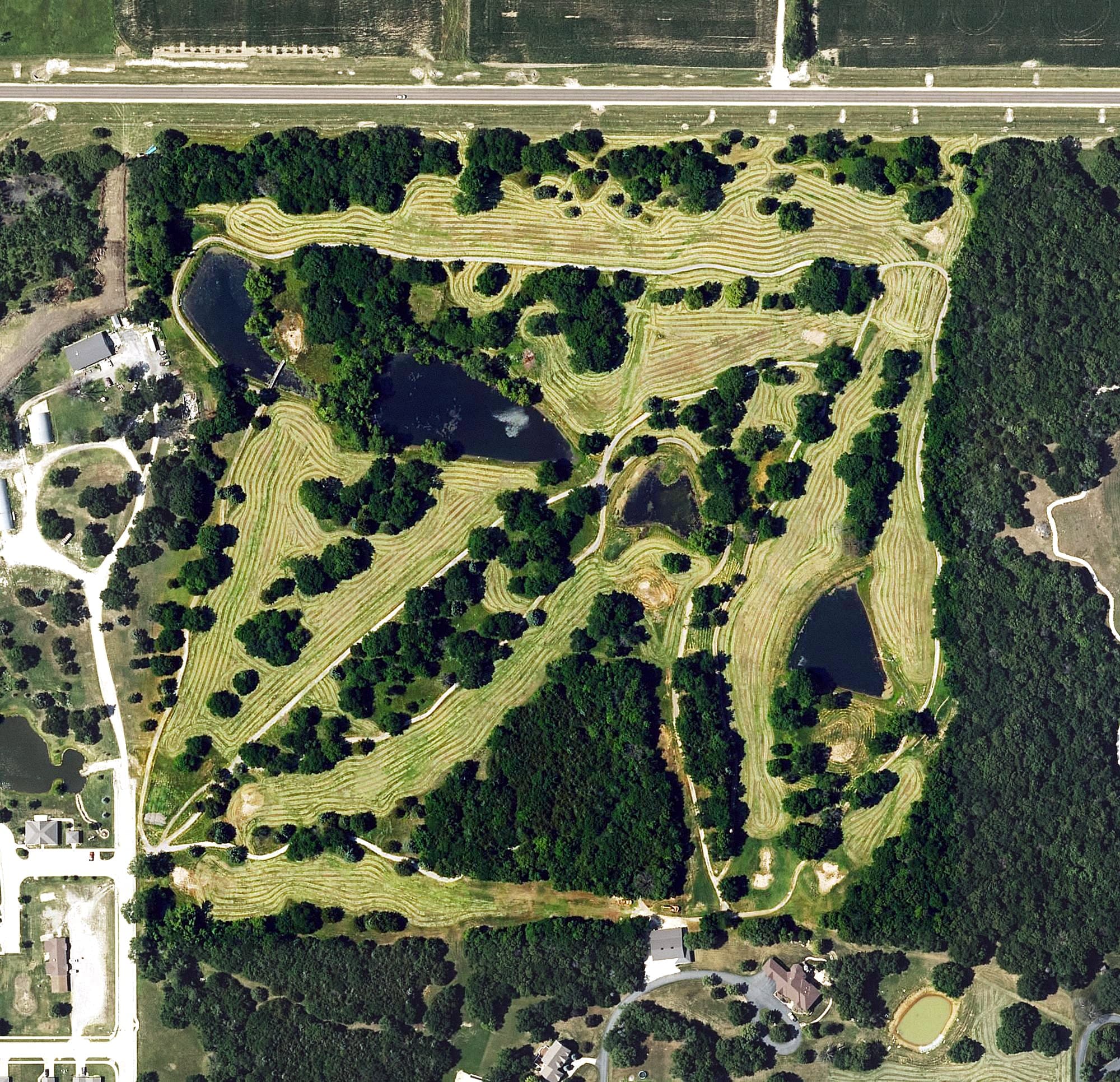 Aerial view of Cedarbrook Golf Course, KS, with its hole routing marked