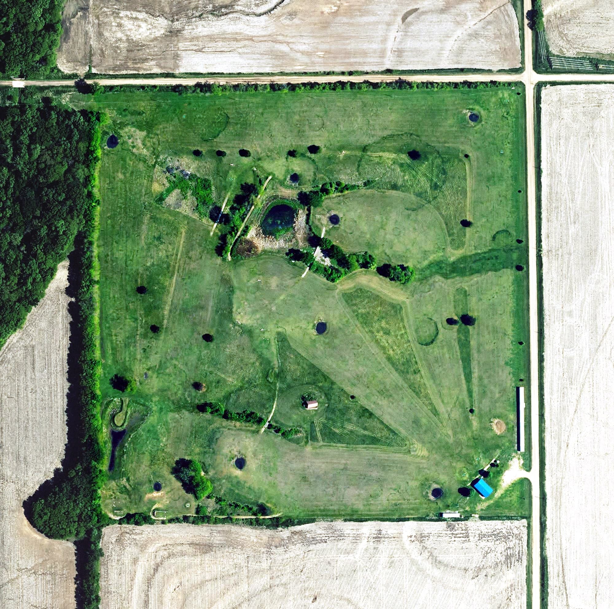 Aerial view of Clyde Golf Course, KS, with its hole routing marked