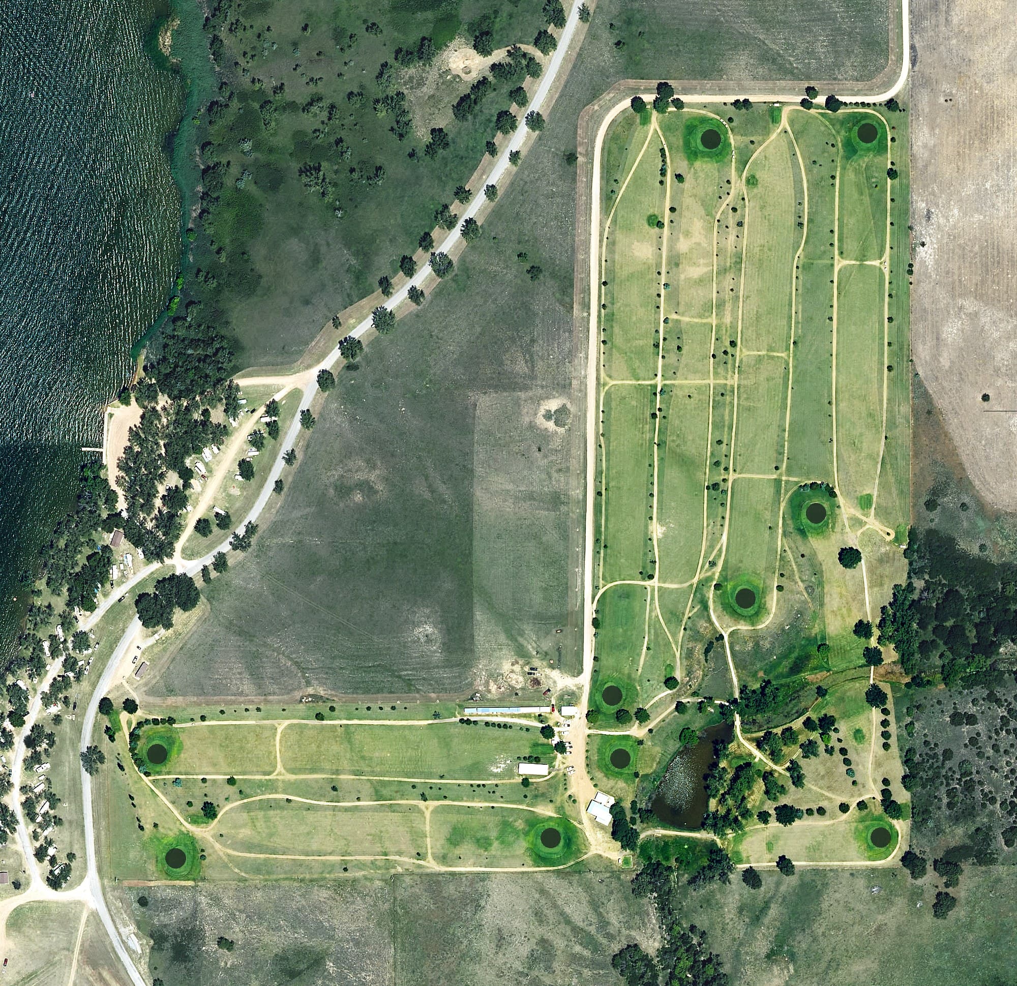 Aerial view of Coldwater Country Club, KS, with its hole routing marked