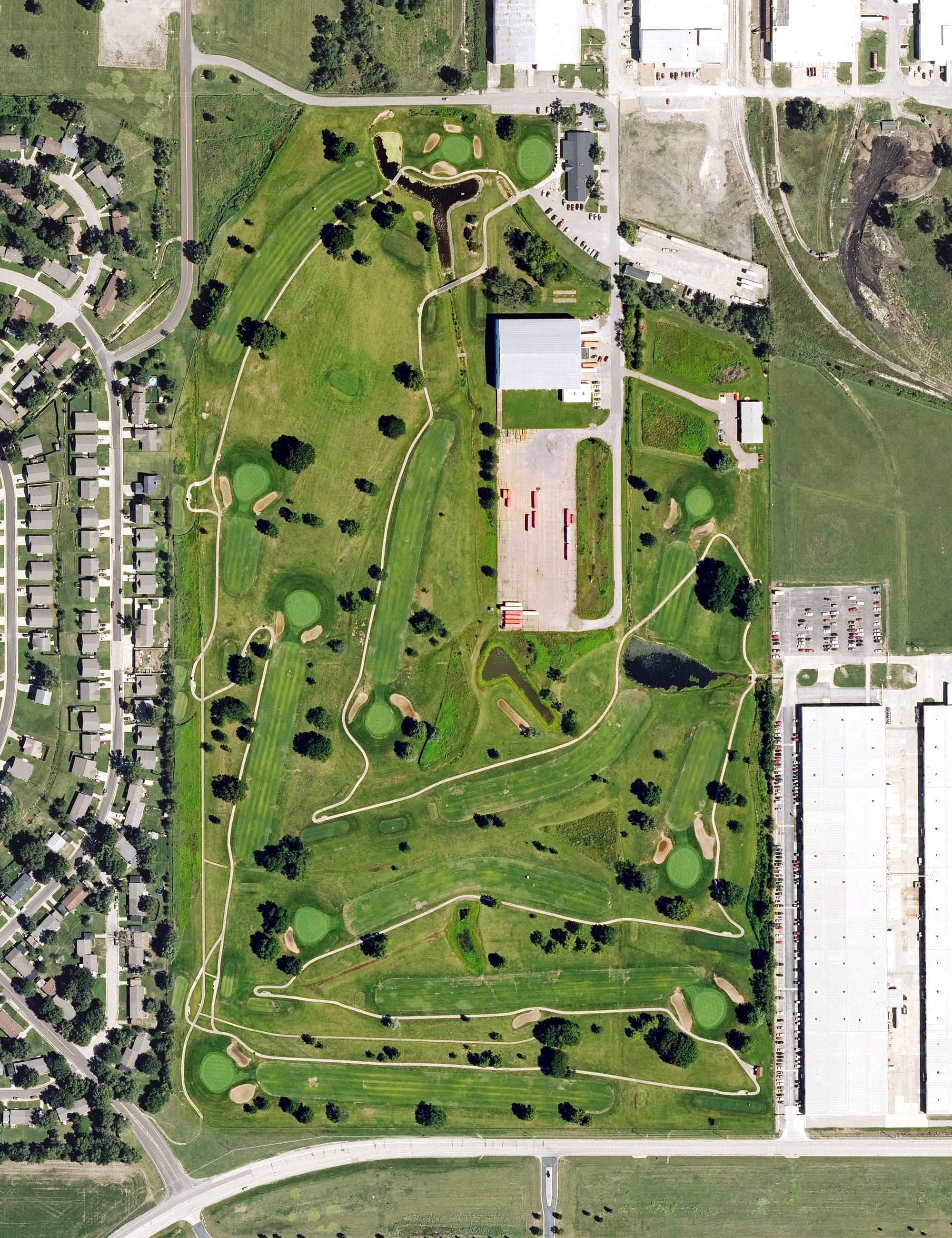 Aerial view of Forbes Public Golf Course, KS, with its hole routing marked