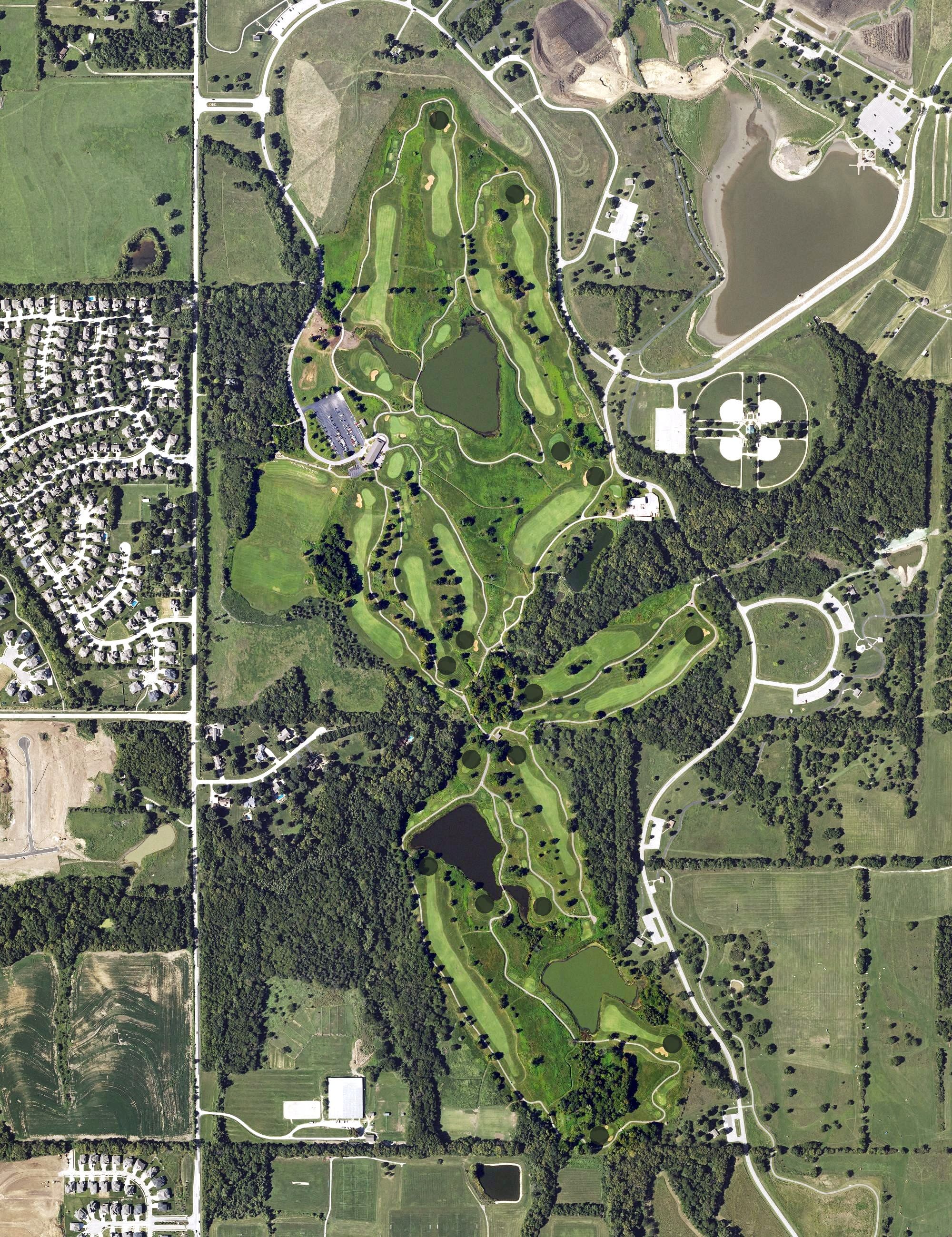 Aerial view of Heritage Park Golf Course, KS, with its hole routing marked