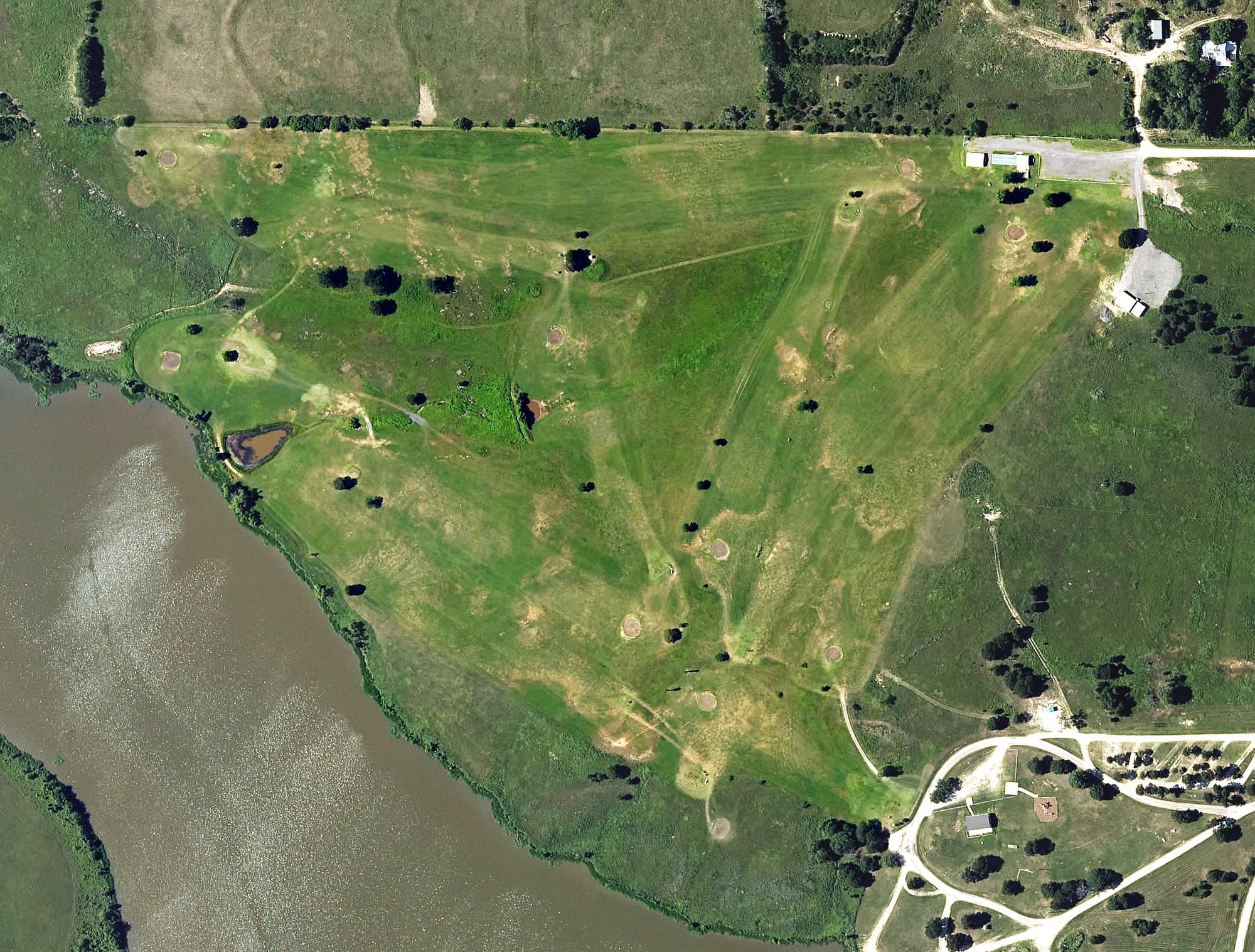 Aerial view of Lakeside Golf Course (Pasture), KS, with its hole routing marked