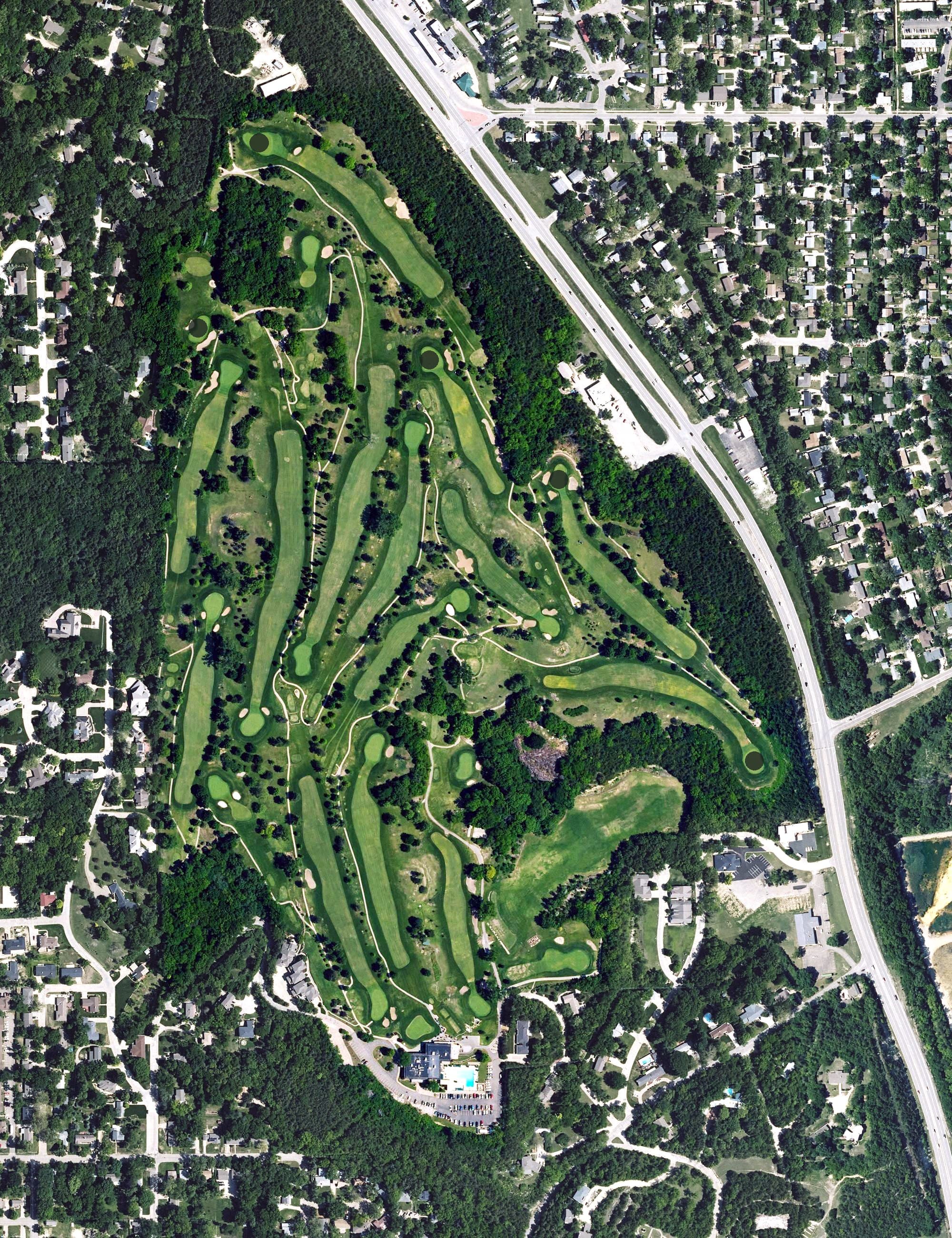 Aerial view of Manhattan Country Club, KS, with its hole routing marked
