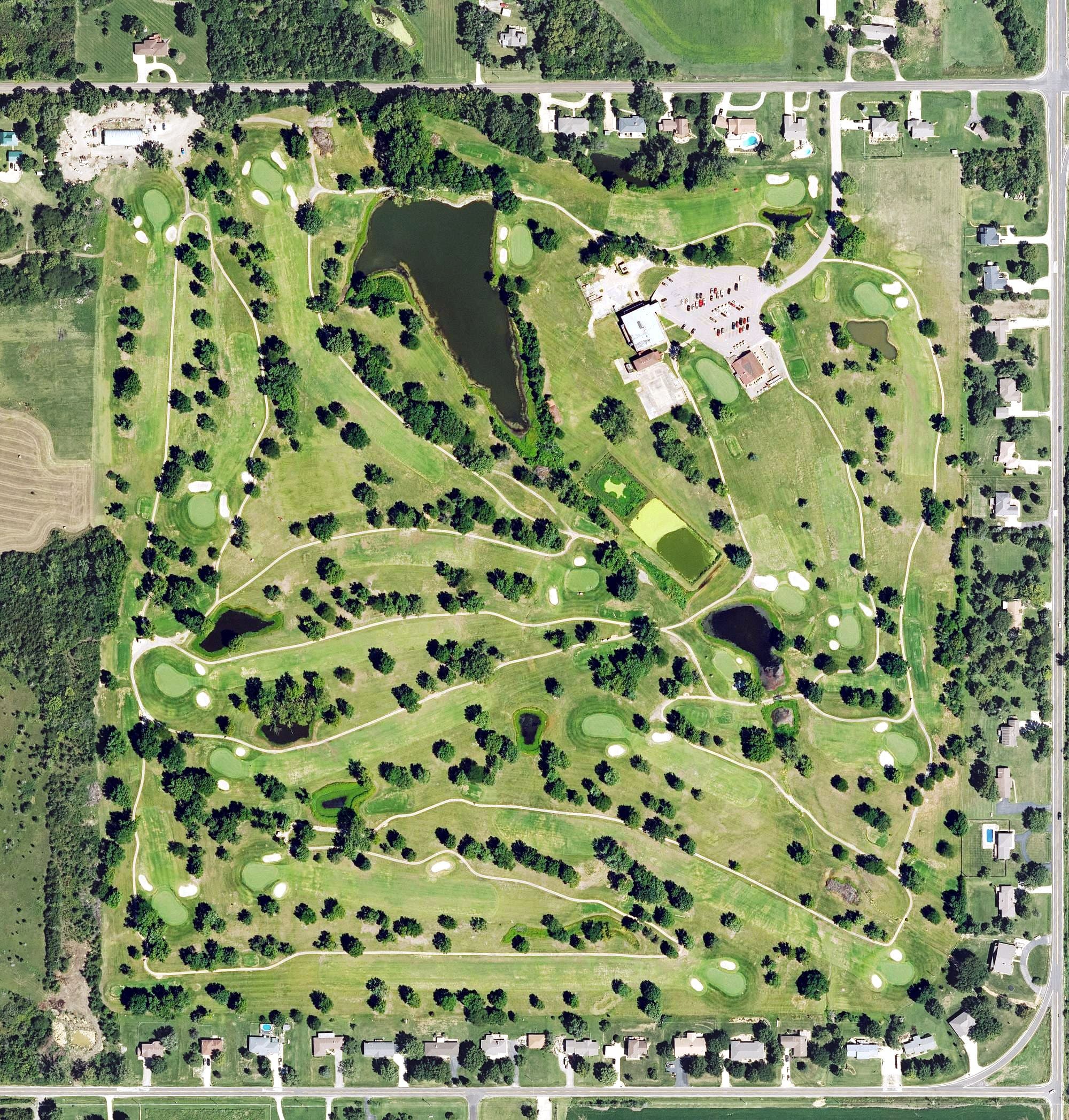 Aerial view of Western Hill Golf Club, KS, with its hole routing marked