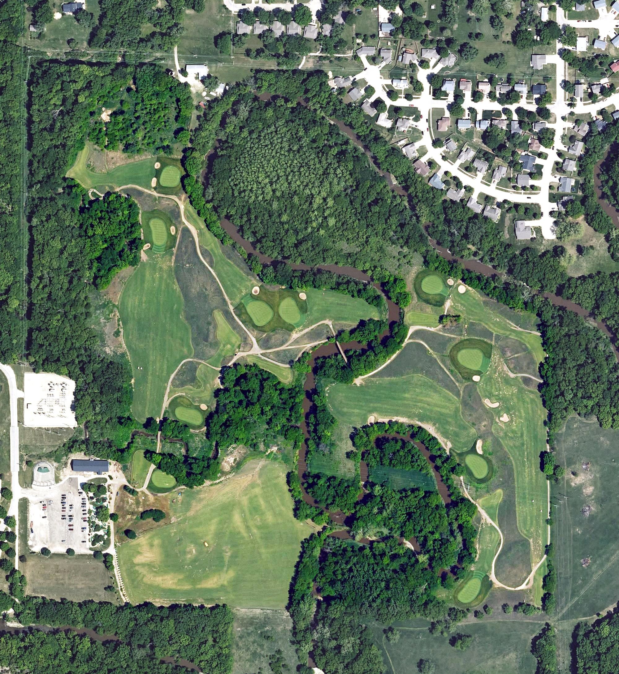Aerial view of Wildcat Creek Golf & Fitness, KS, with its hole routing marked