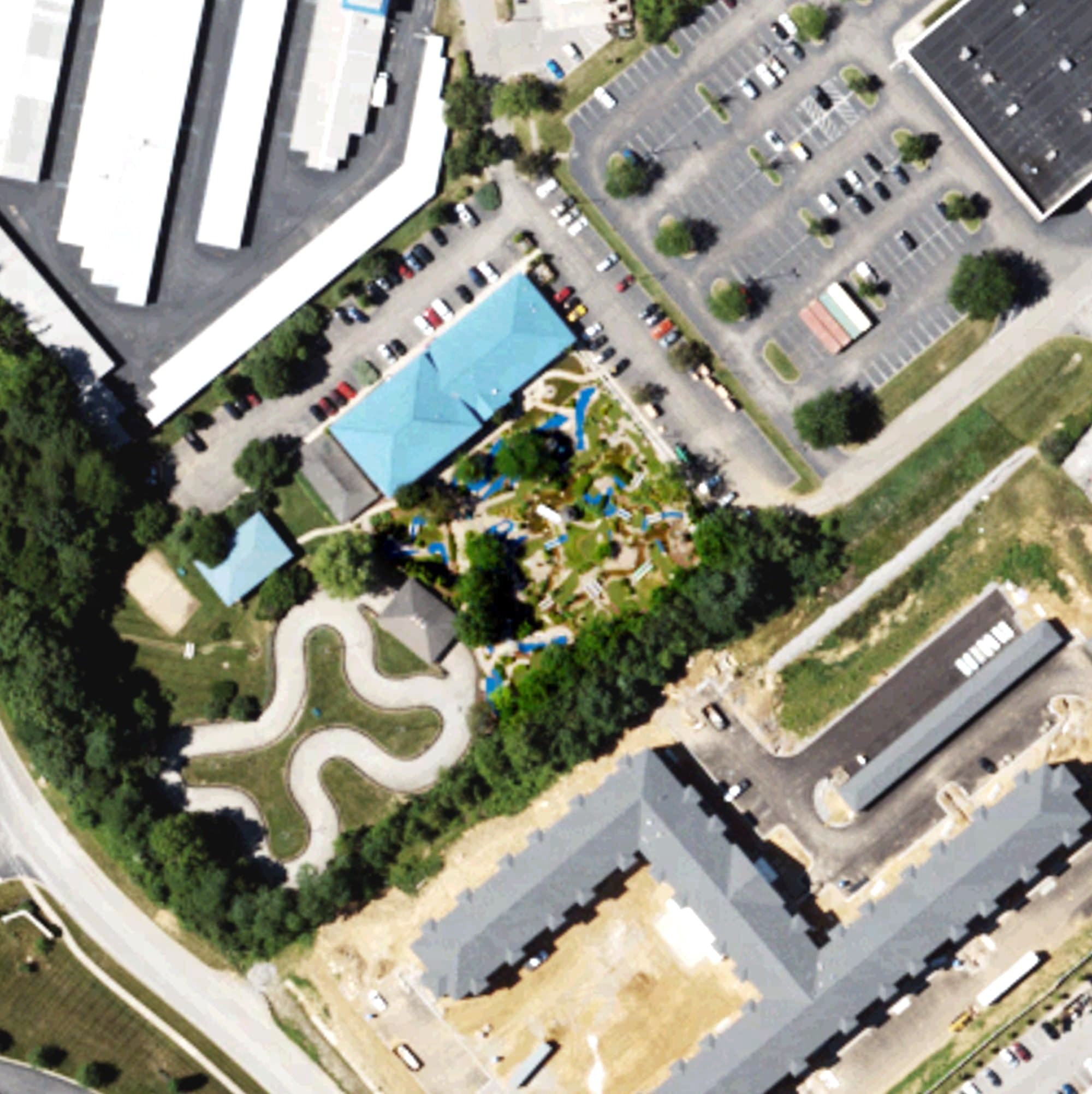 Aerial view of Mini-golf Course, KY, with its hole routing marked