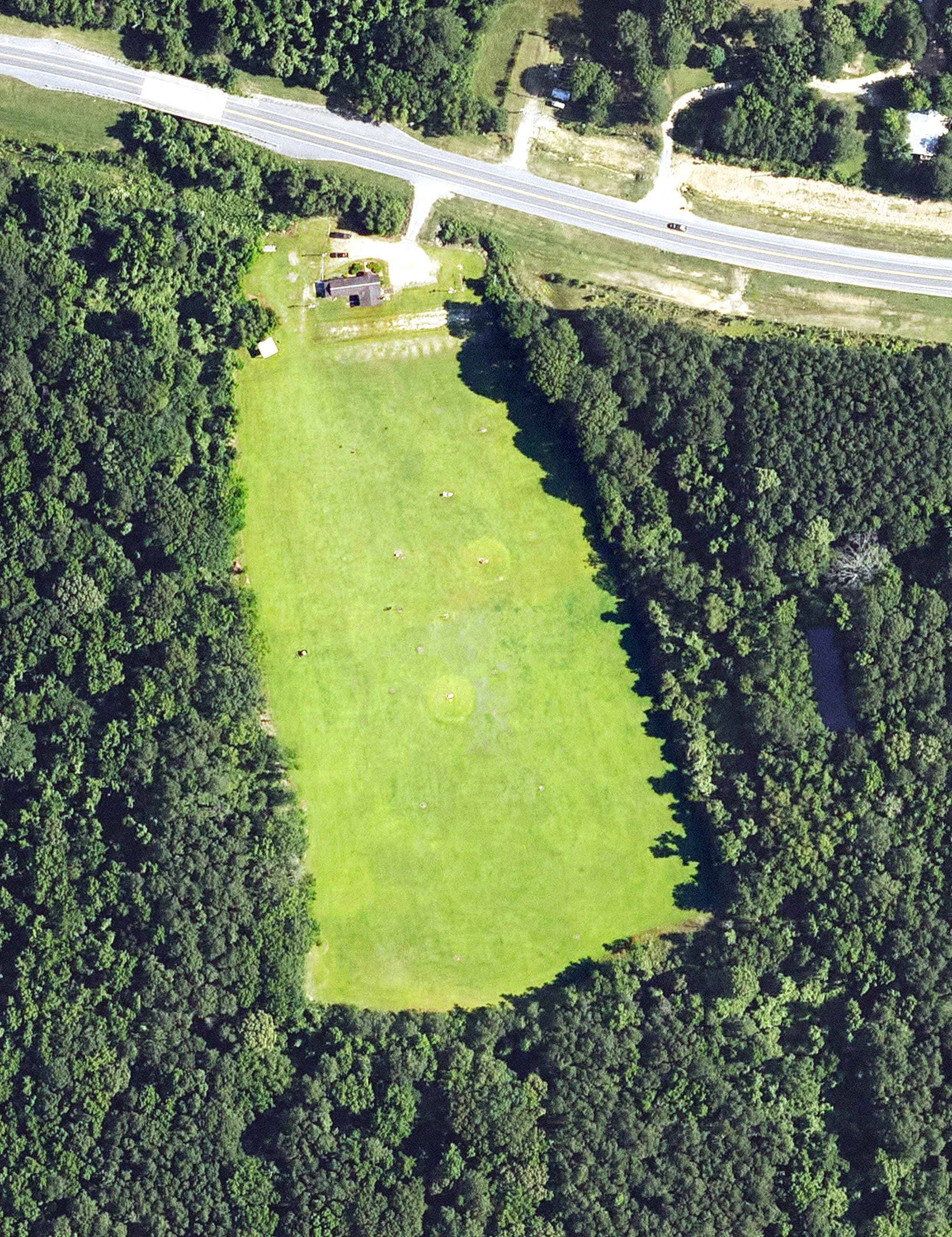 Aerial view of Hole In One Driving Range, LA, with its hole routing marked