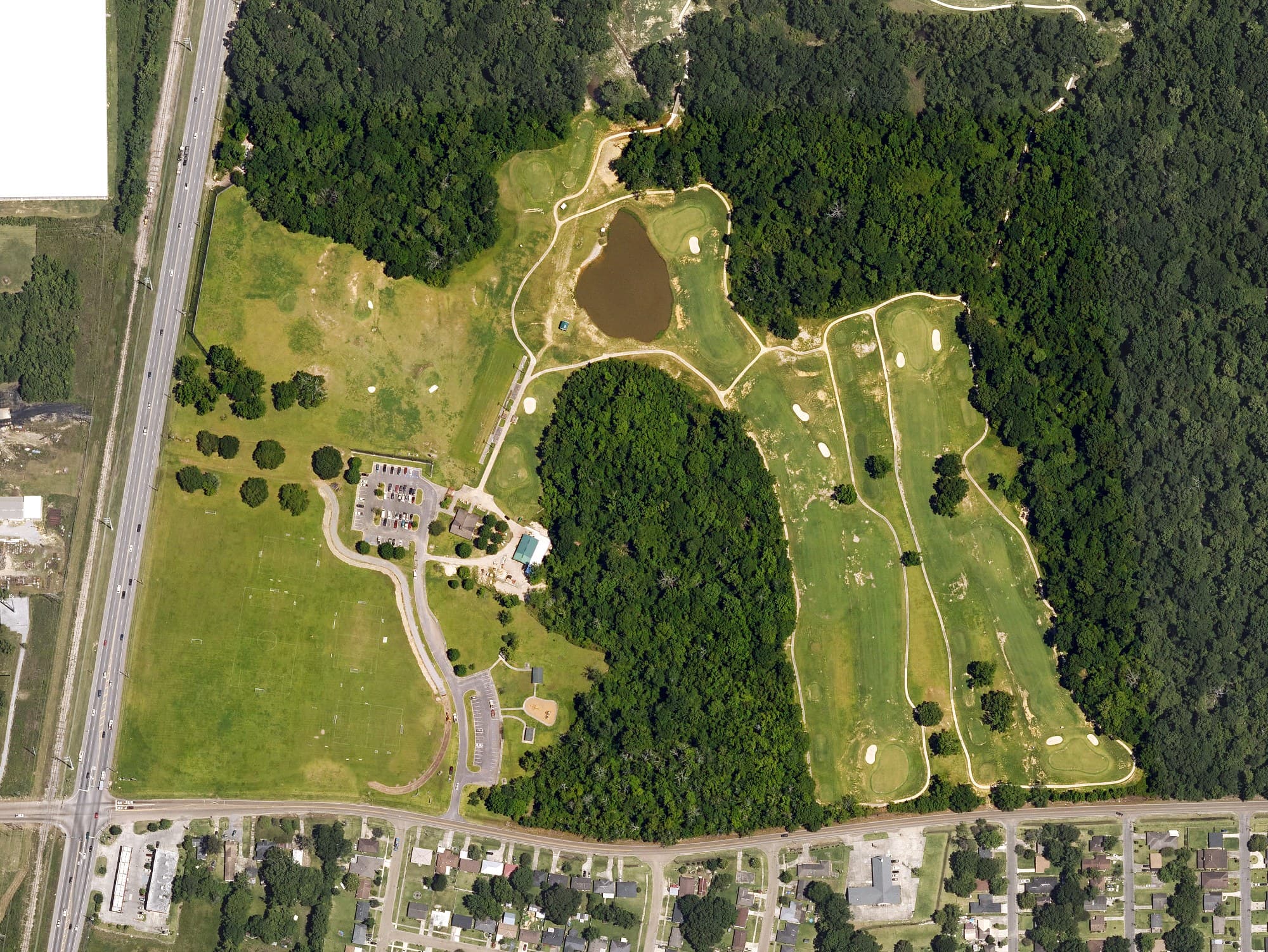 Aerial view of J.S. Clark Golf Course, LA, with its hole routing marked