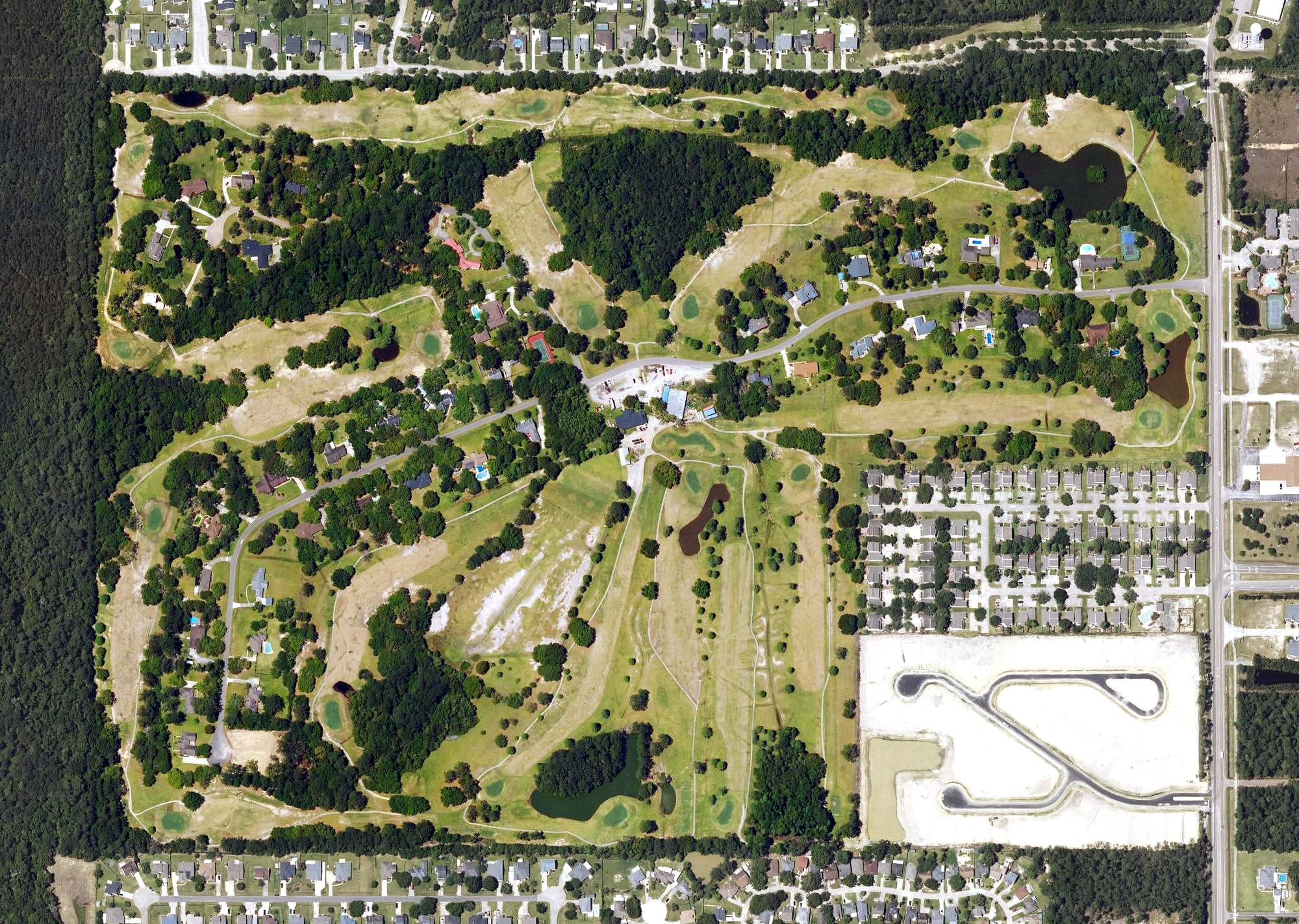 Aerial view of Royal Golf Course, LA, with its hole routing marked